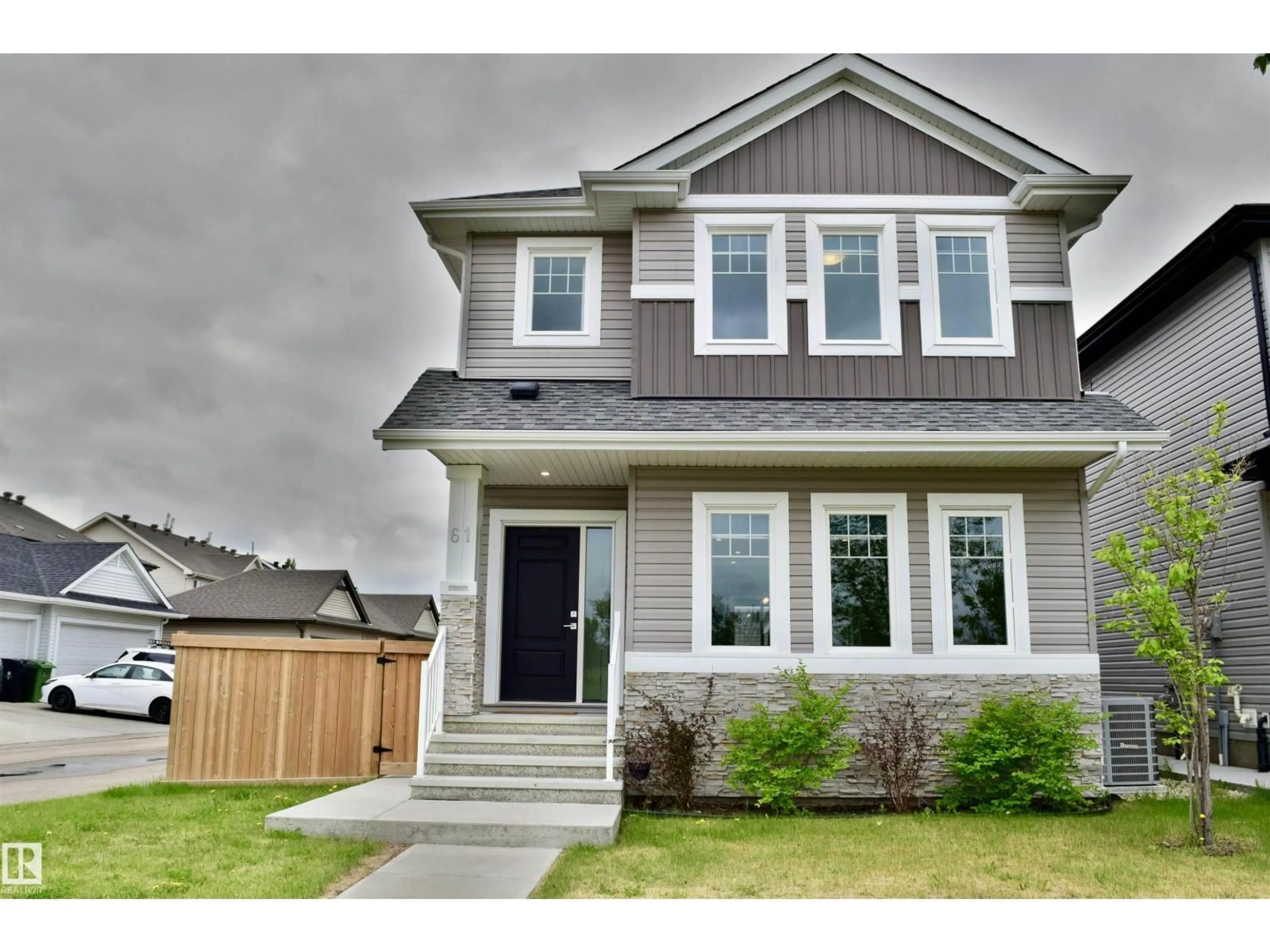 Home with vinyl exterior material, street for 61 DILLINGHAM AV, Fort Saskatchewan Alberta T8L0N2