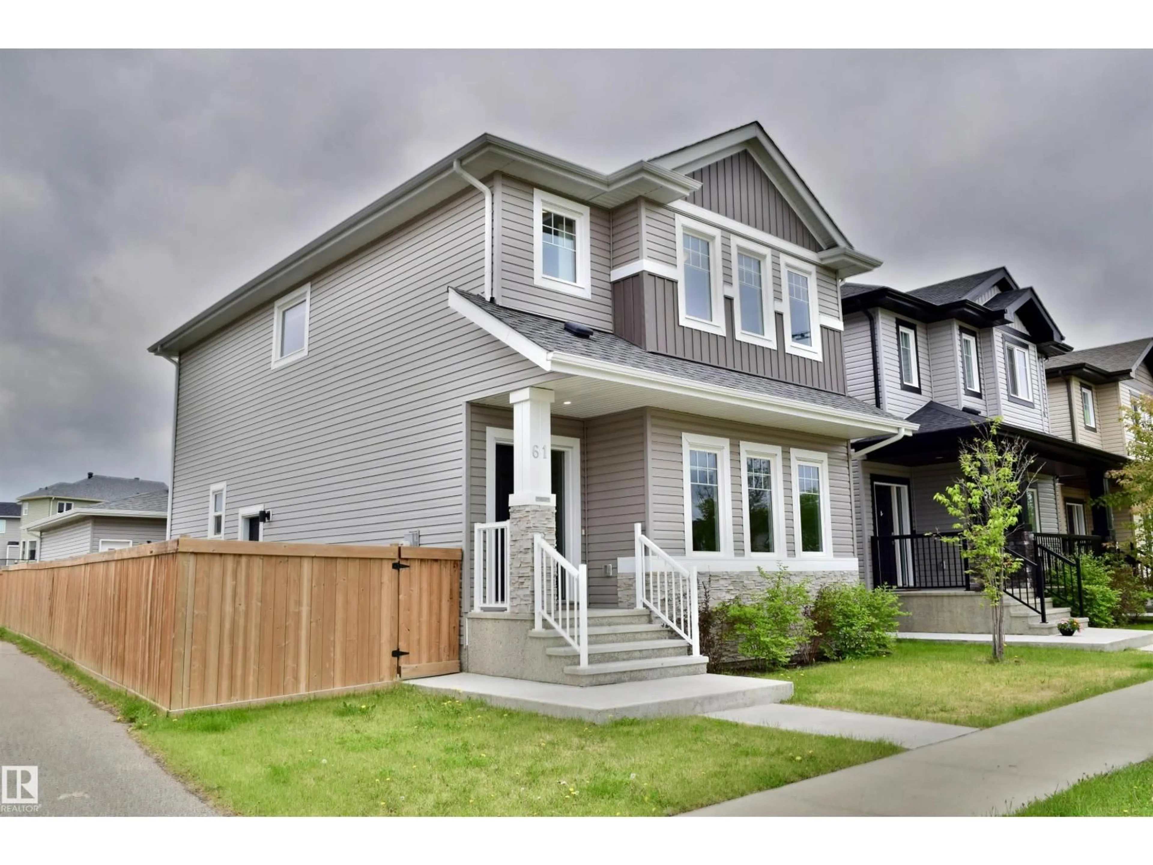 Home with vinyl exterior material, street for 61 DILLINGHAM AV, Fort Saskatchewan Alberta T8L0N2