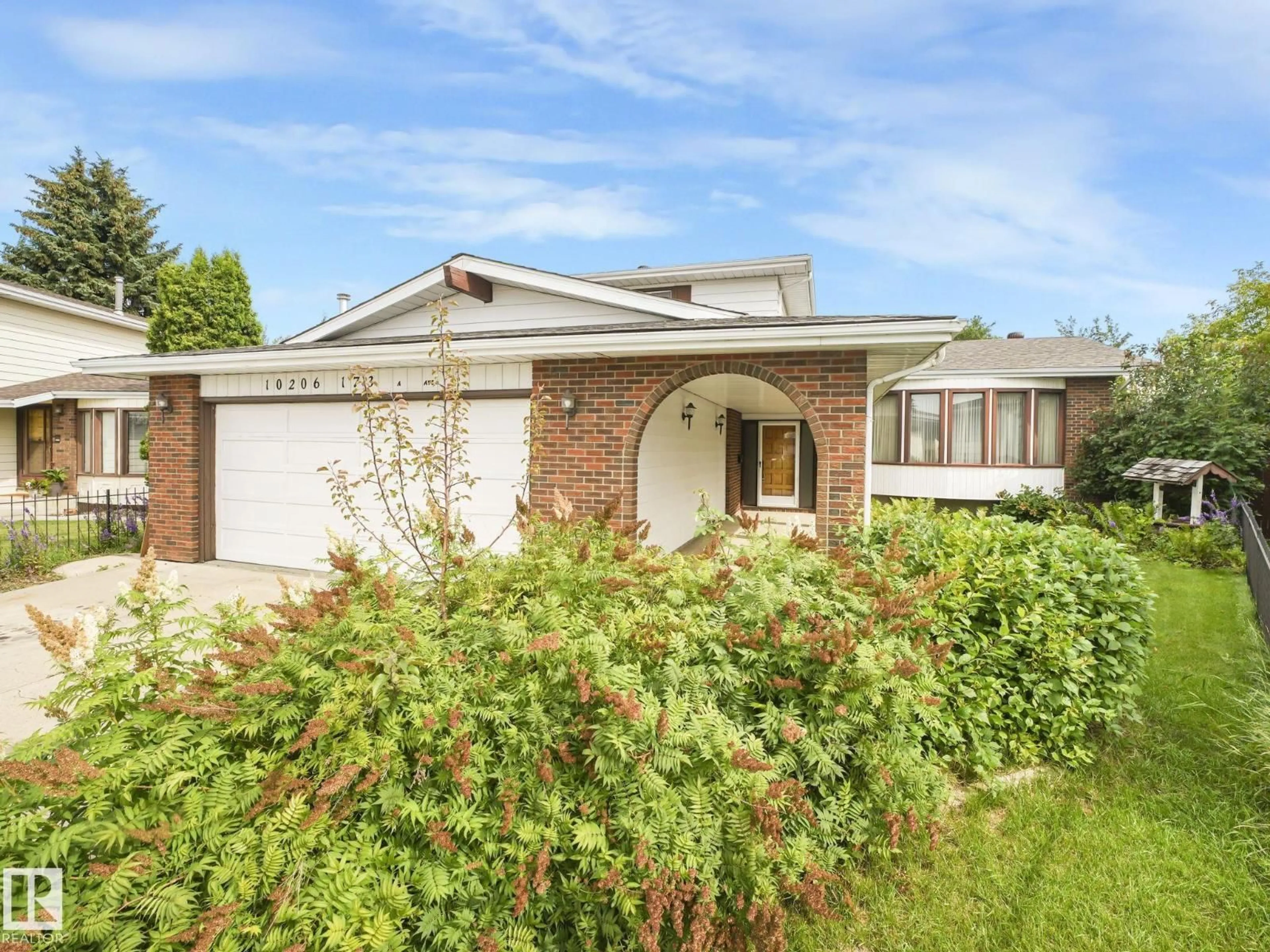 Home with brick exterior material, street for 10206 173A AV, Edmonton Alberta T5X3X2