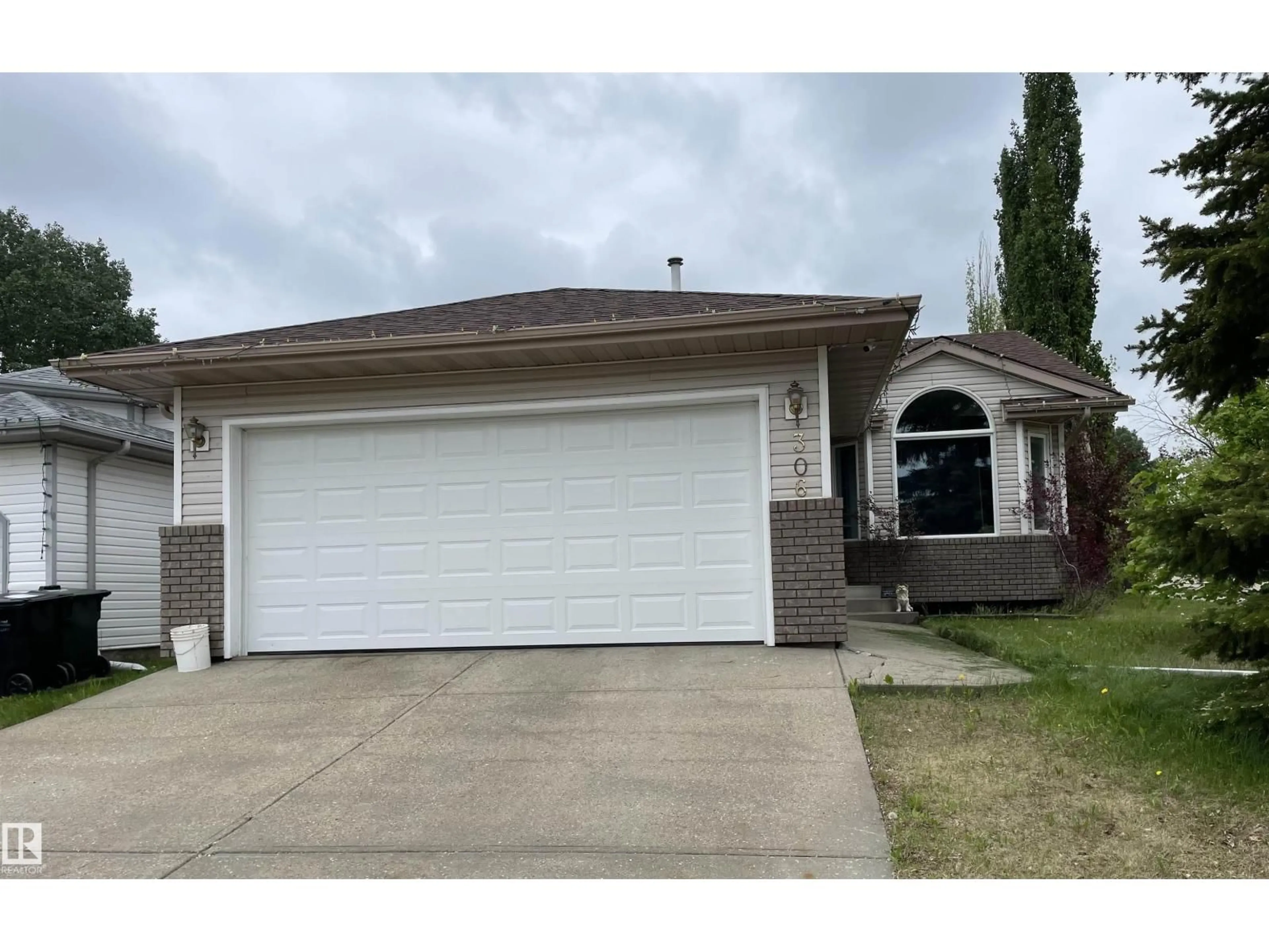 Home with vinyl exterior material, street for 306 REGENCY DR, Sherwood Park Alberta T8A5P4