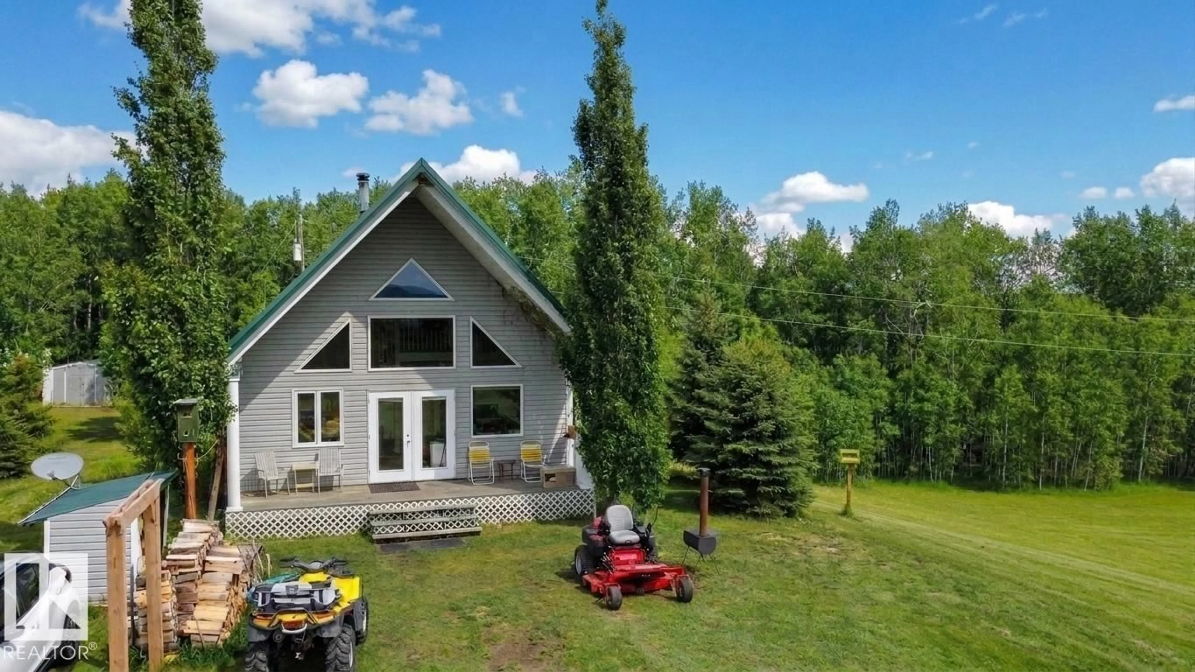A pic from outside/outdoor area/front of a property/back of a property/a pic from drone, unknown for 58416 RGE ROAD 74, Rural Lac Ste. Anne County Alberta T0E1Y0