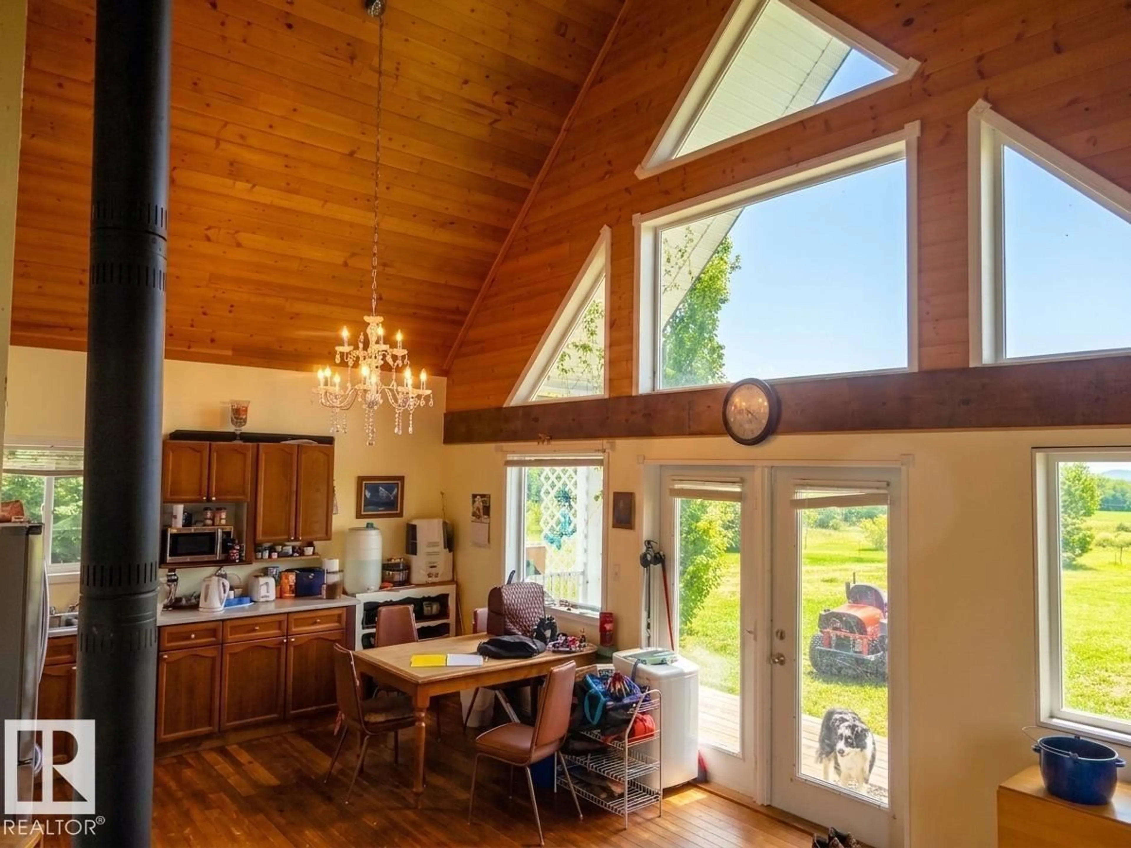 Open concept kitchen, wood/laminate floor for 58416 RGE ROAD 74, Rural Lac Ste. Anne County Alberta T0E1Y0