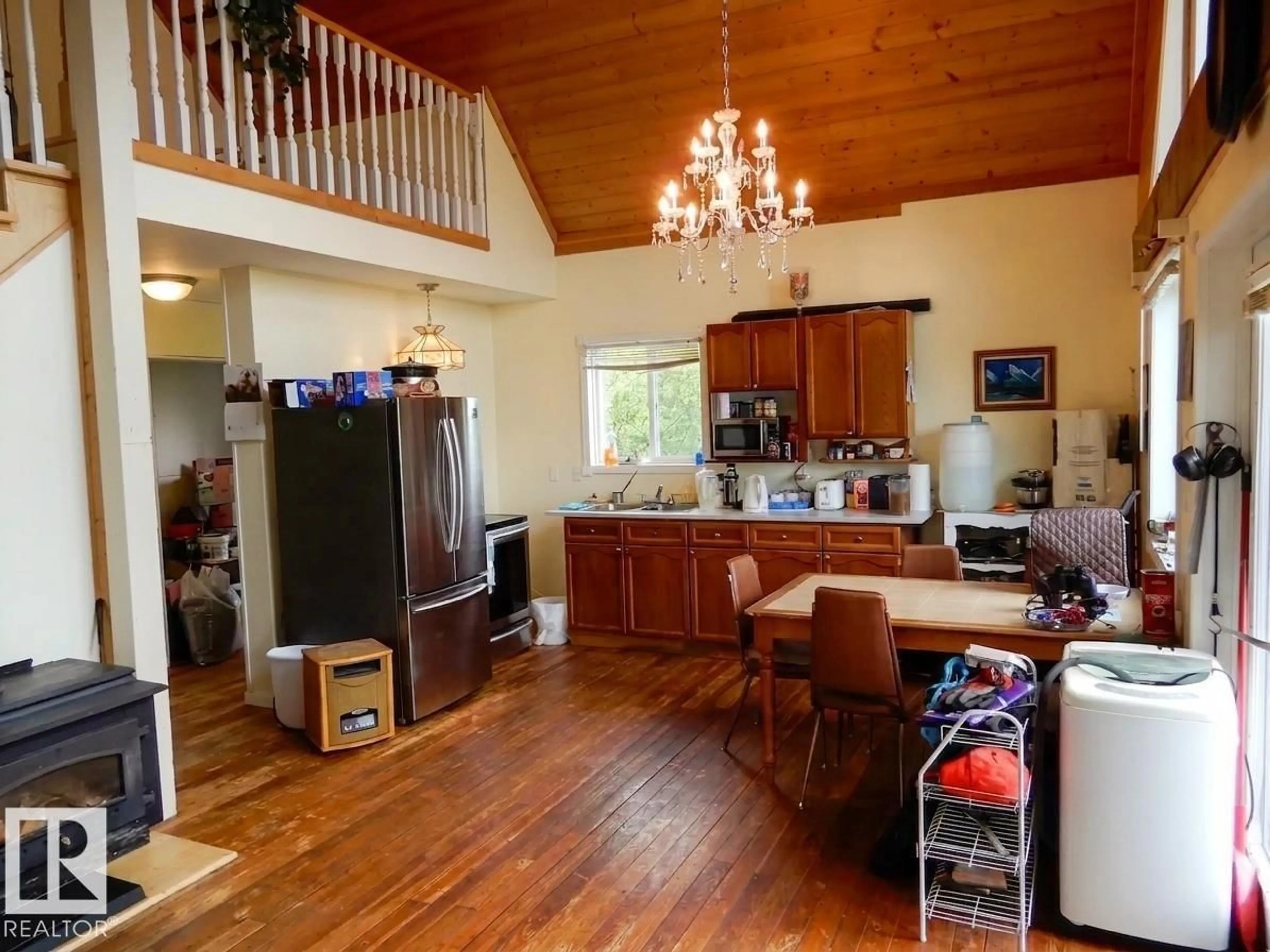 Open concept kitchen, wood/laminate floor for 58416 RGE ROAD 74, Rural Lac Ste. Anne County Alberta T0E1Y0