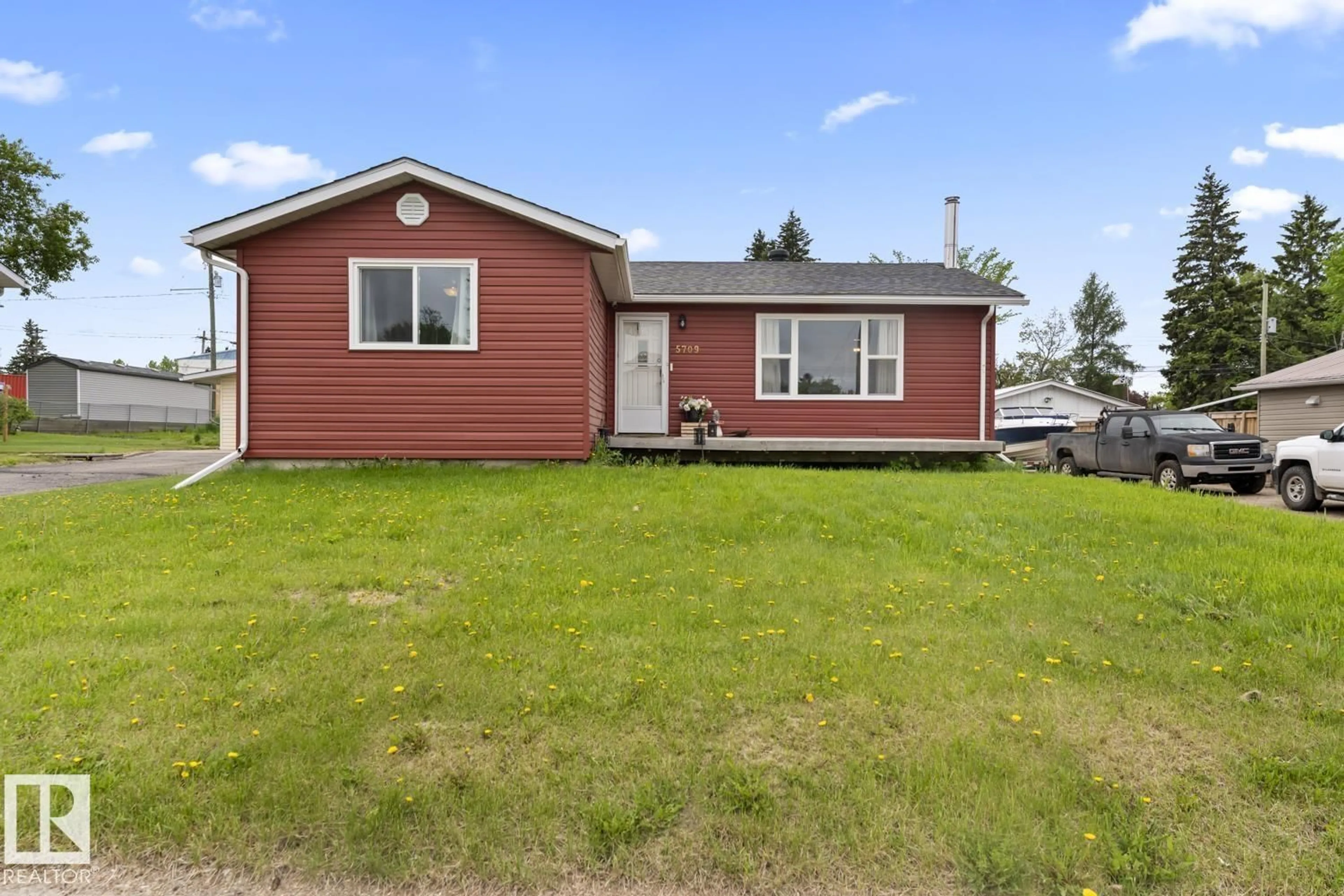 Home with vinyl exterior material, street for 5709 51 AV, Cold Lake Alberta T9M1S4