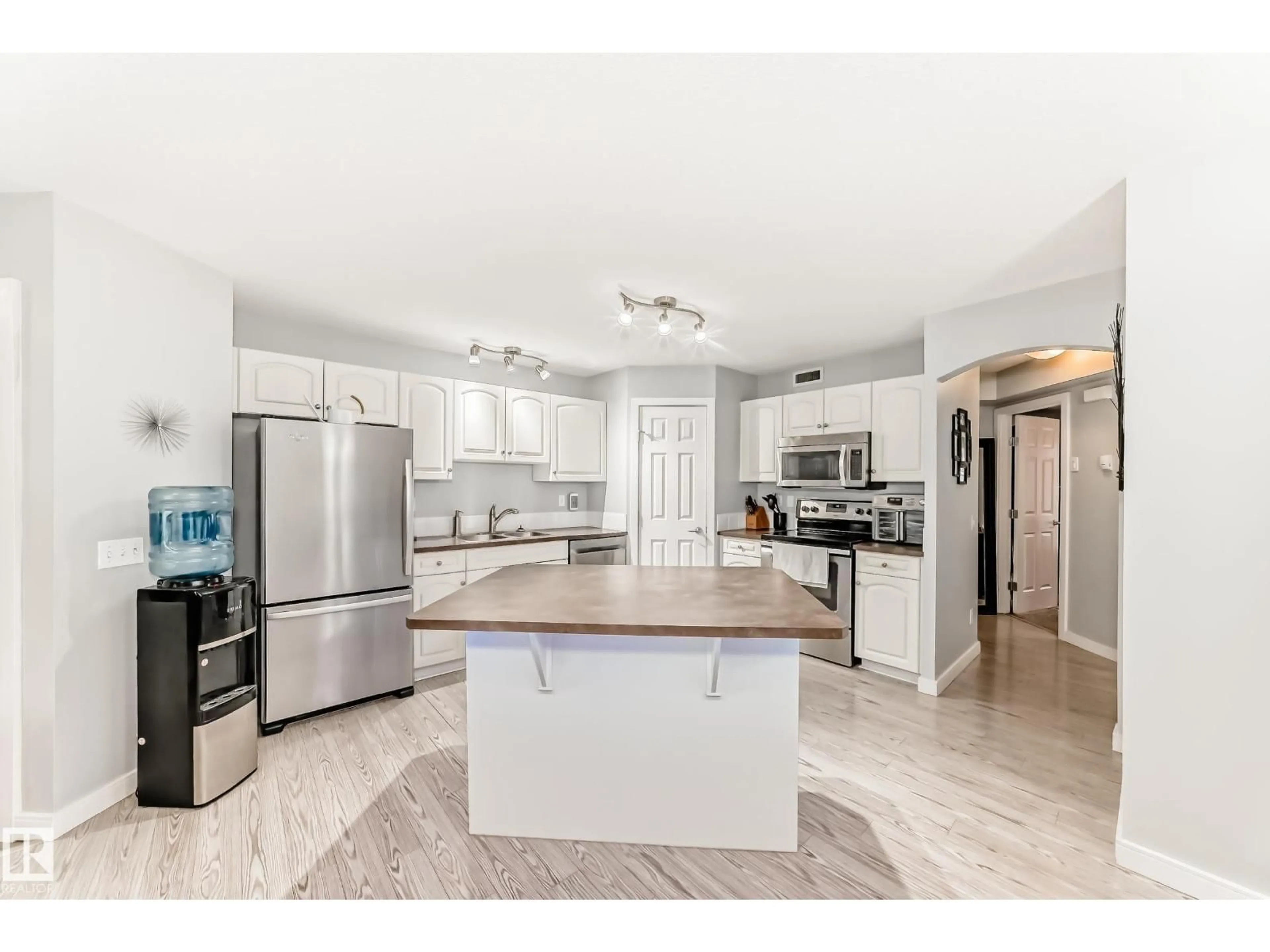 Open concept kitchen, ceramic/tile floor for 150 - 53 EDWARDS DR, Edmonton Alberta T6X1G2