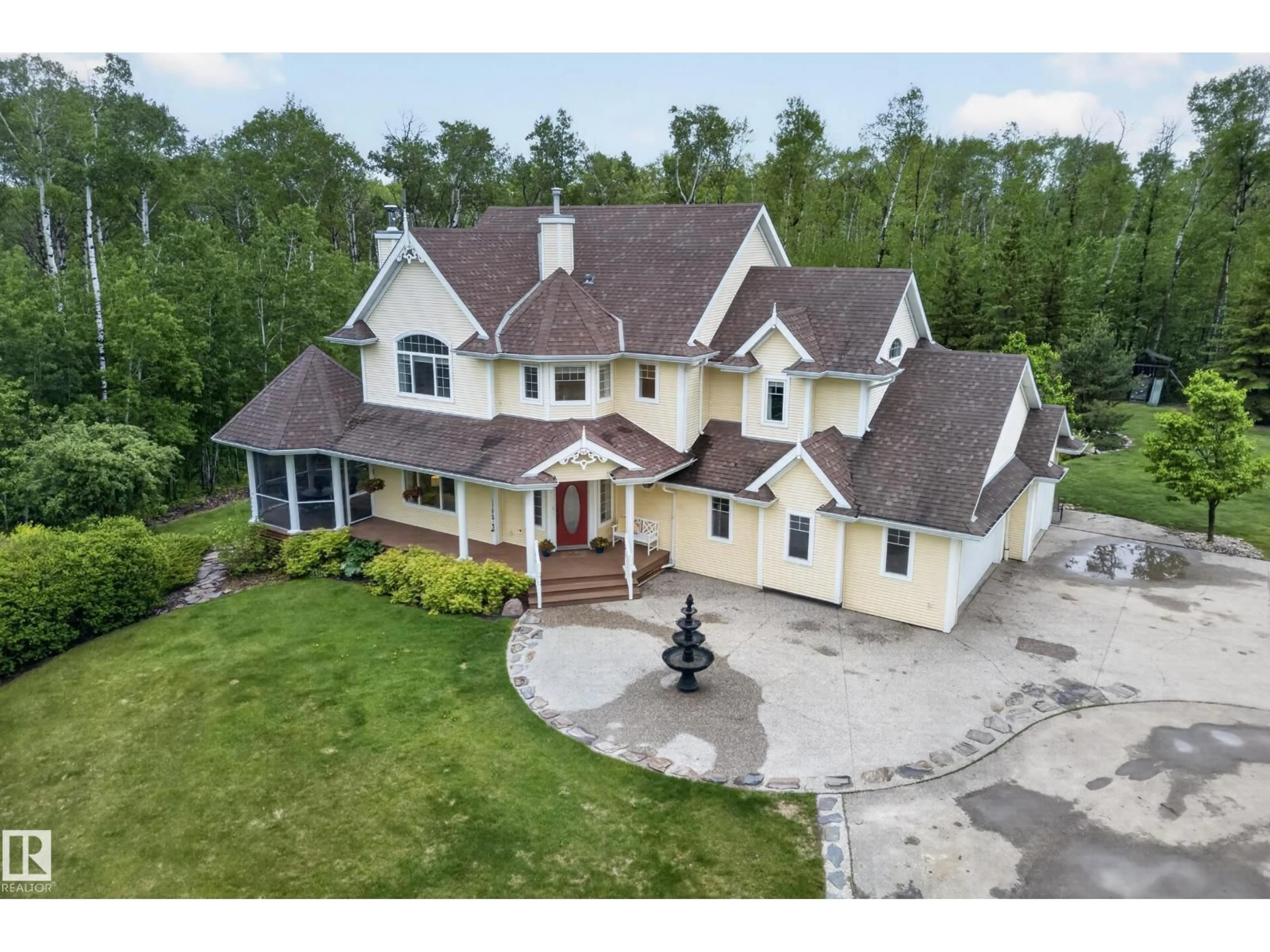 A pic from outside/outdoor area/front of a property/back of a property/a pic from drone, building for 23007 TWP RD 505A, Rural Leduc County Alberta T0B3M1