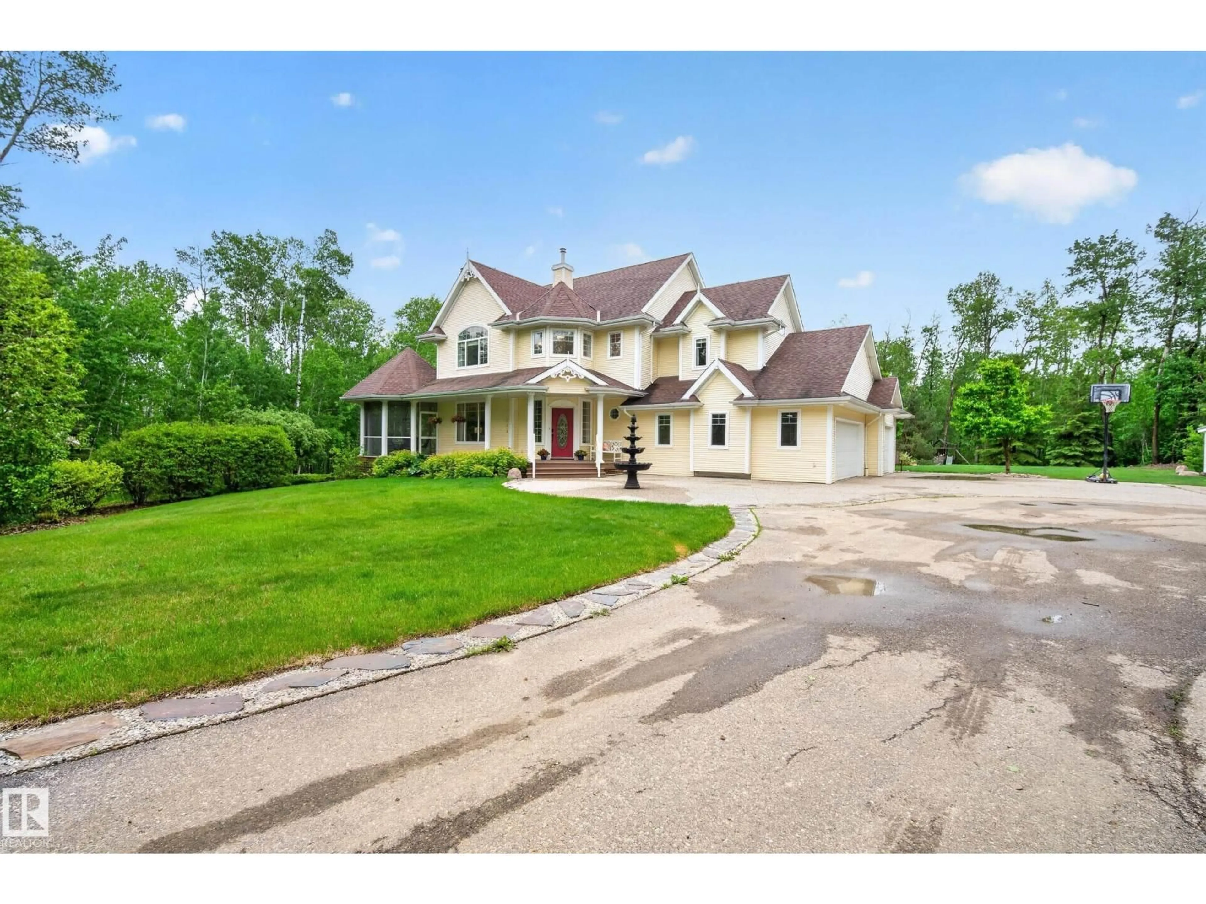 A pic from outside/outdoor area/front of a property/back of a property/a pic from drone, street for 23007 TWP RD 505A, Rural Leduc County Alberta T0B3M1