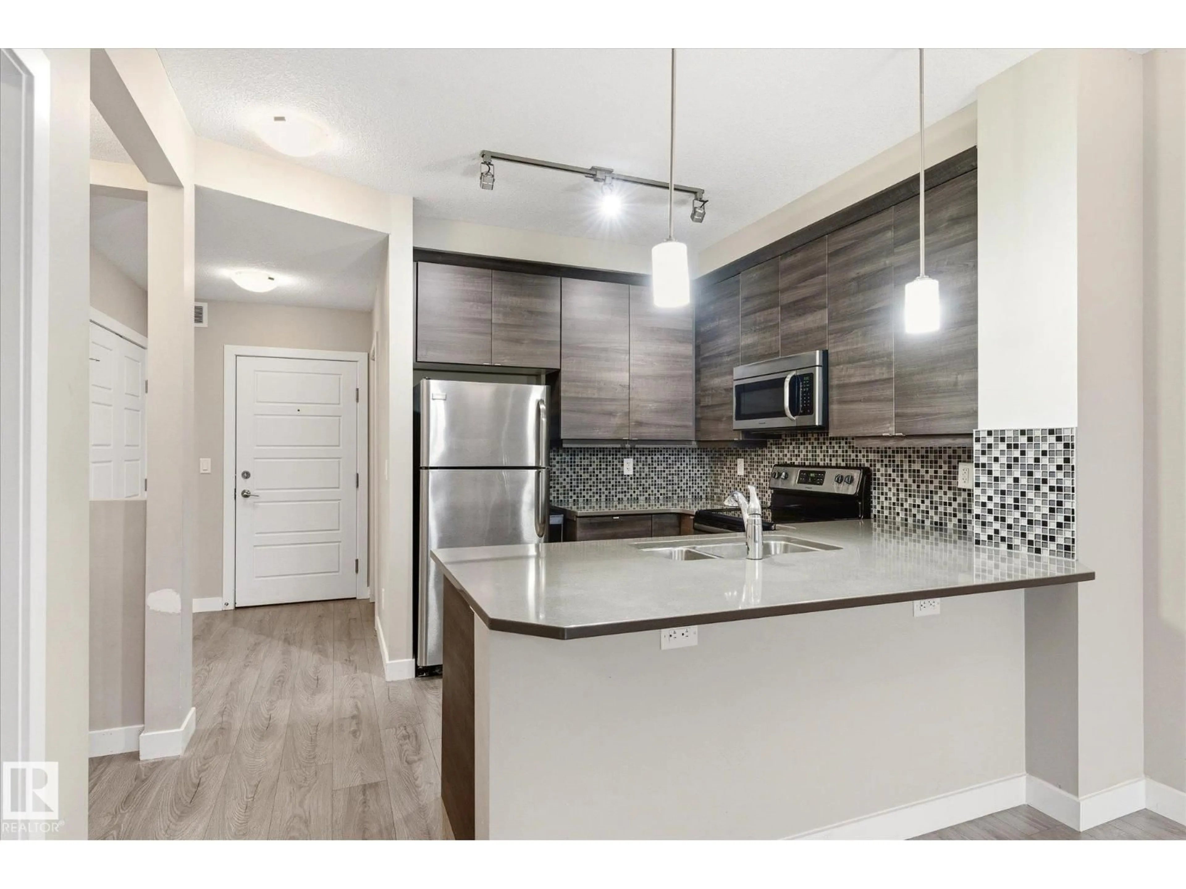 Open concept kitchen, unknown for 218 - 2590 ANDERSON WY, Edmonton Alberta T6W0R2