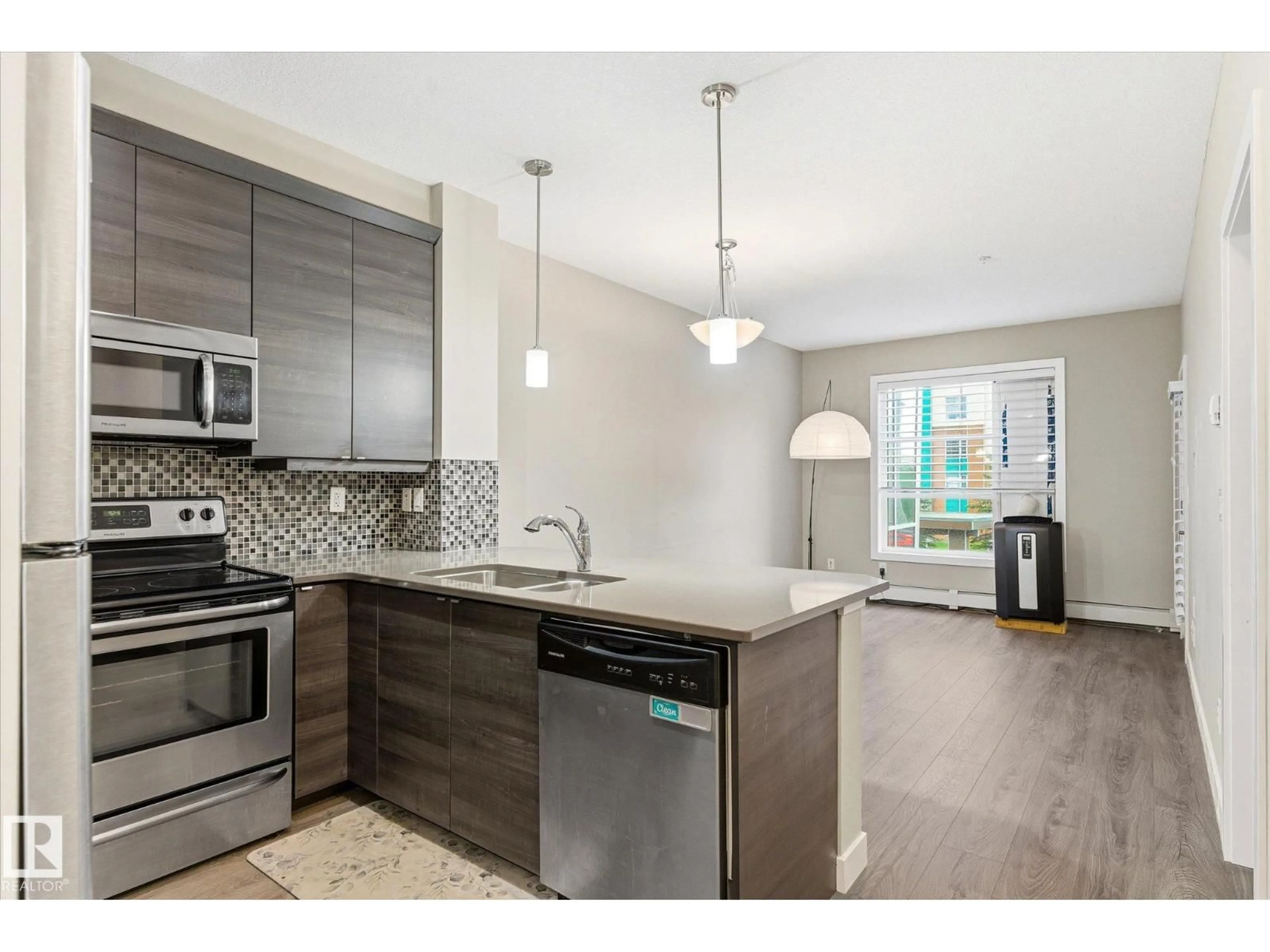 Open concept kitchen, unknown for 218 - 2590 ANDERSON WY, Edmonton Alberta T6W0R2