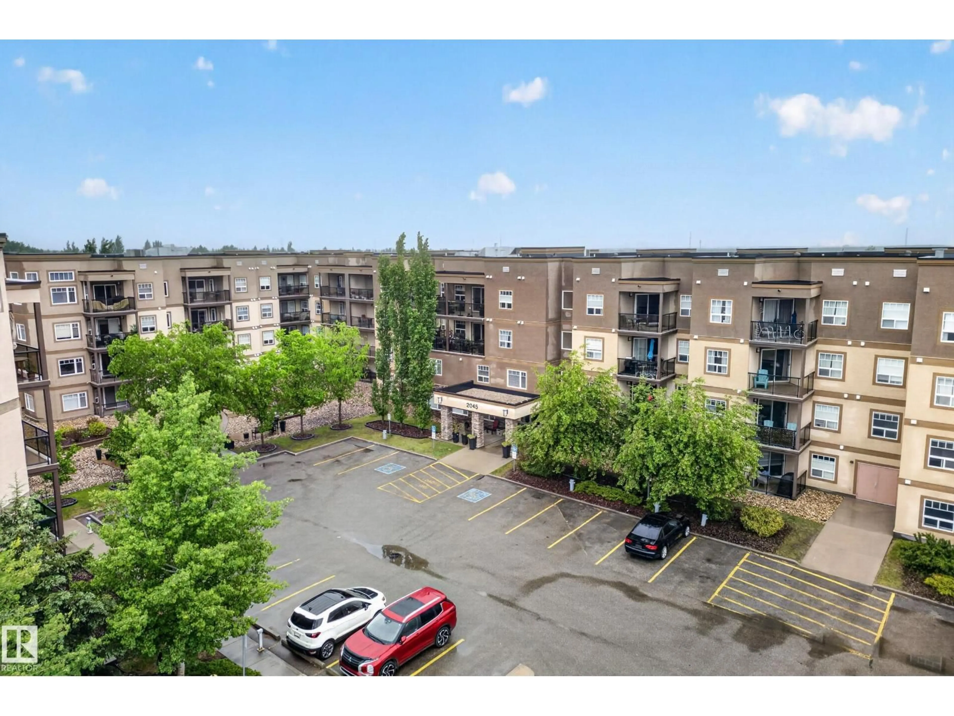 A pic from outside/outdoor area/front of a property/back of a property/a pic from drone, unknown for 207 - 2045 GRANTHAM CO, Edmonton Alberta T5T3X6