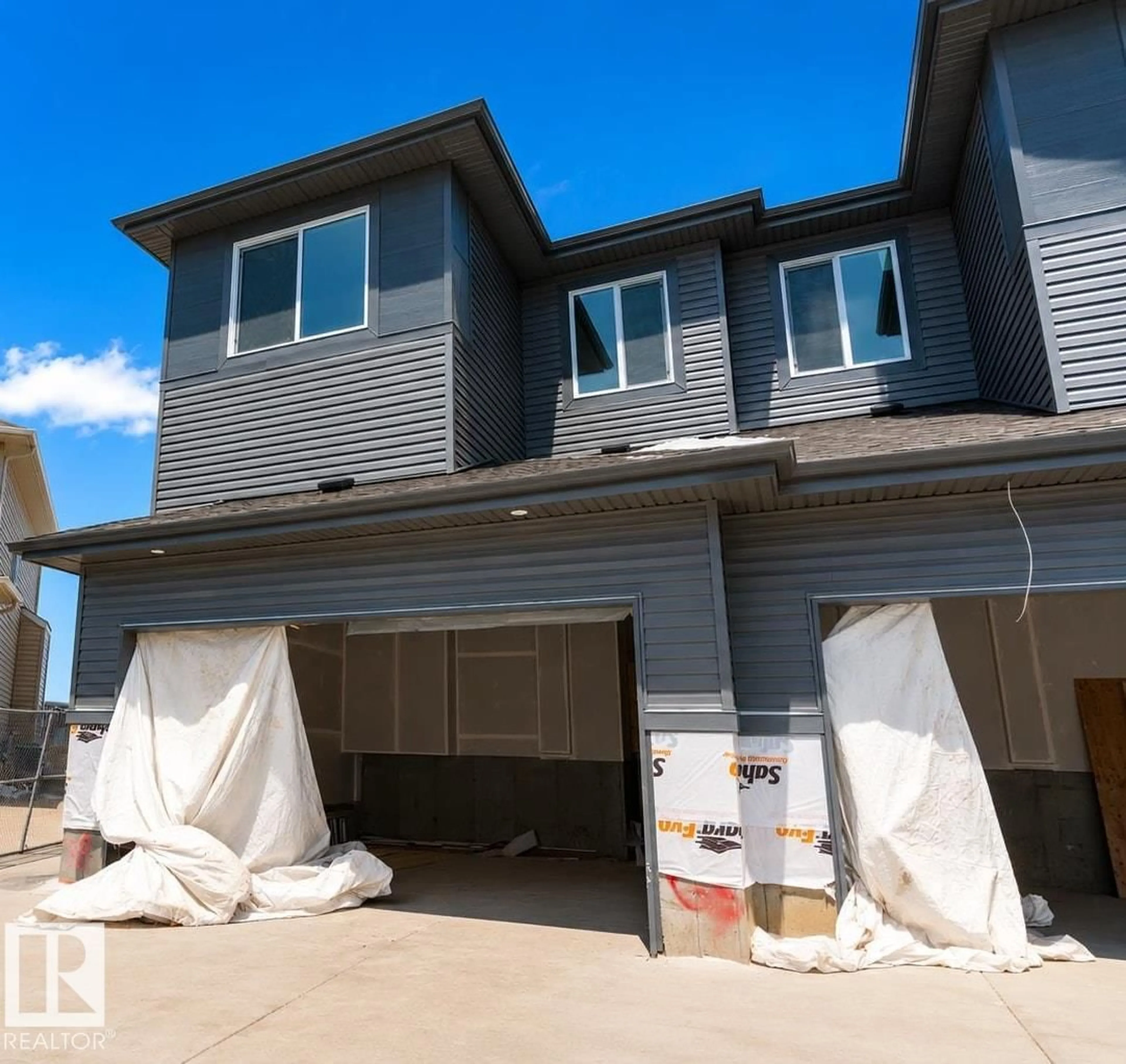 Home with vinyl exterior material, street for 38 ASTORIA PL, Devon Alberta T9G0M7