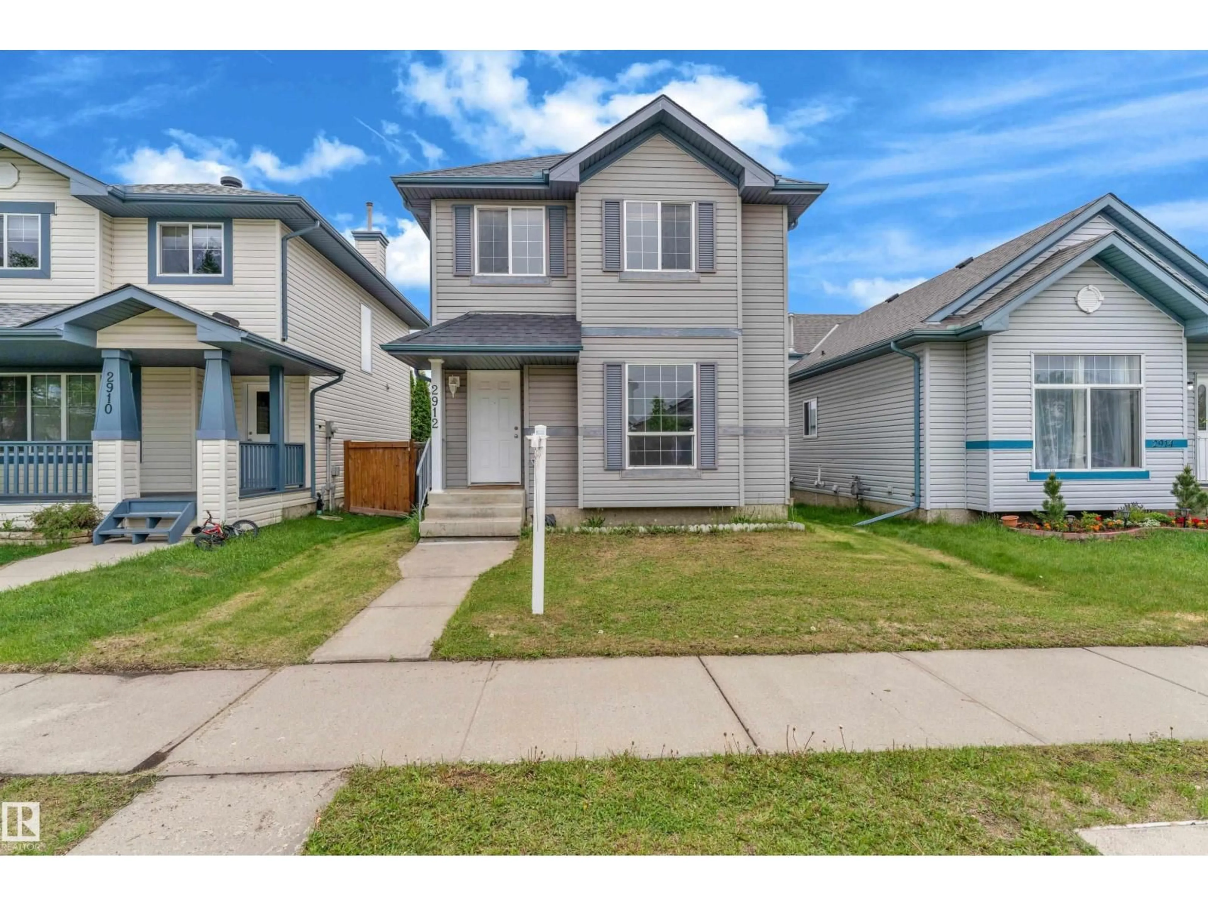Home with vinyl exterior material, street for 2912 31 STREET, Edmonton Alberta T6T1T9