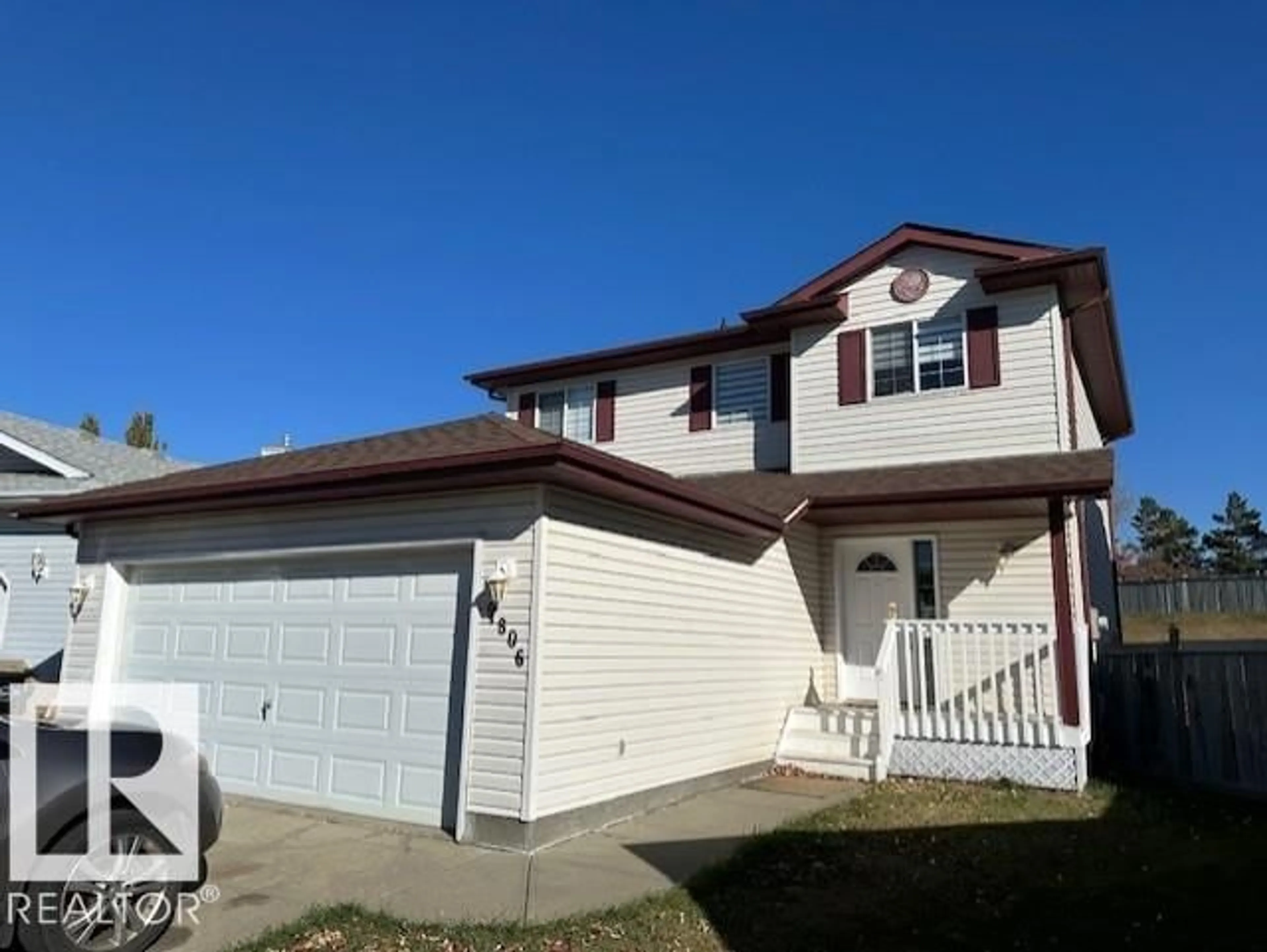 Home with vinyl exterior material, street for 9806 179 AV, Edmonton Alberta T5X6A6