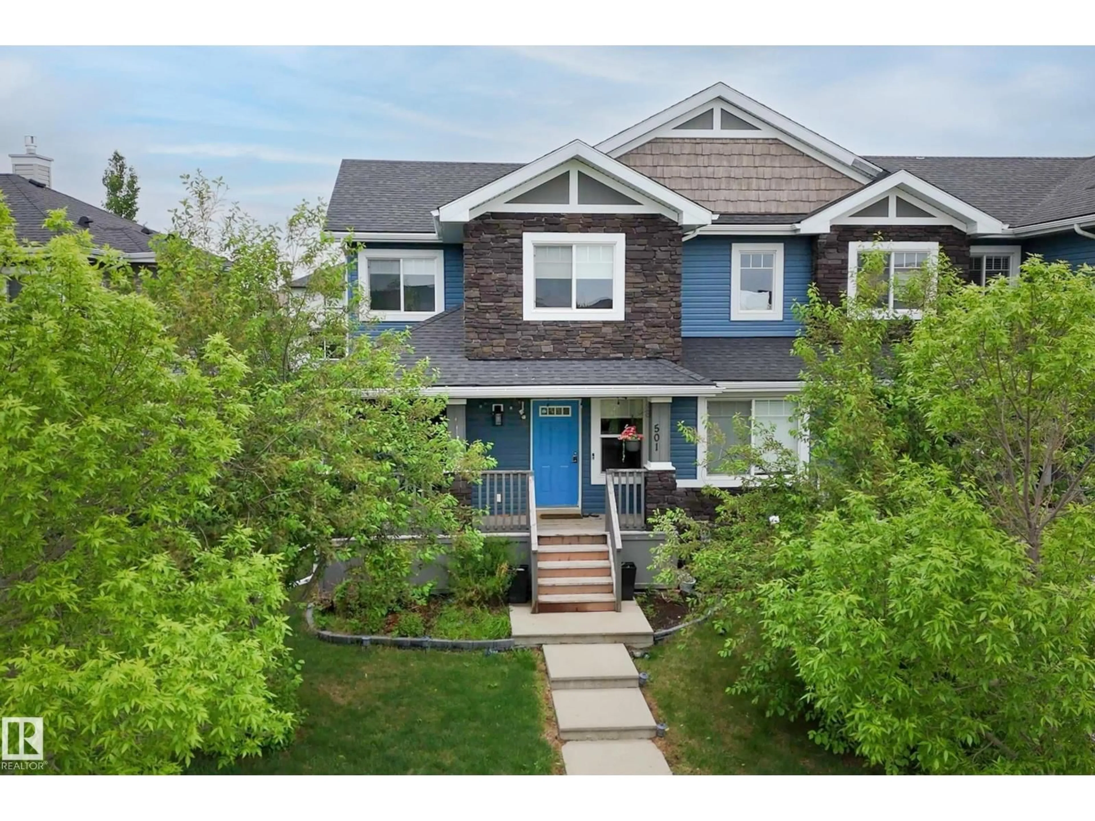 Home with vinyl exterior material, street for 501 CHAPPELLE DR, Edmonton Alberta T6W2B4