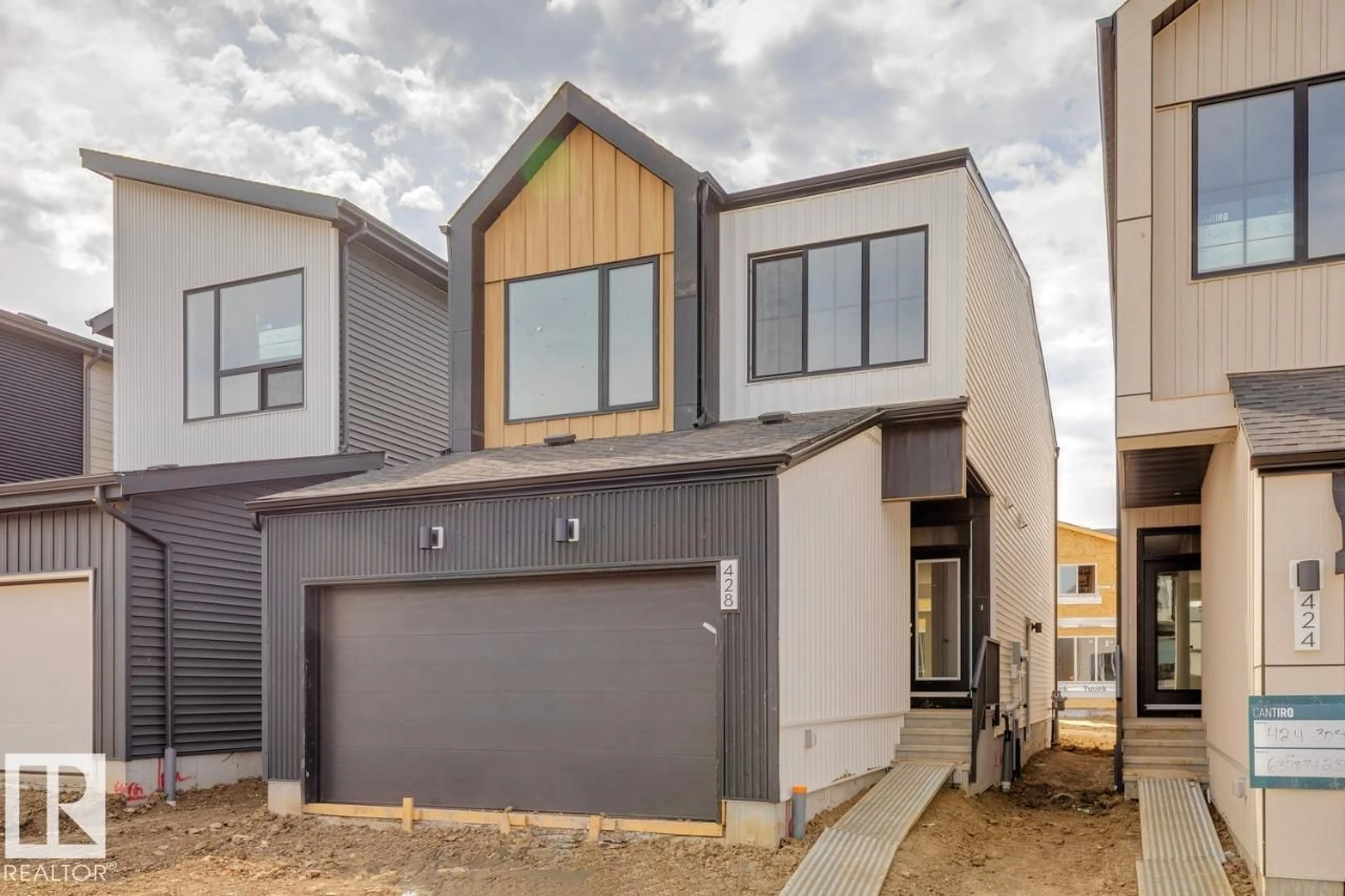 Home with vinyl exterior material, street for 428 30 ST, Edmonton Alberta T6X1A5