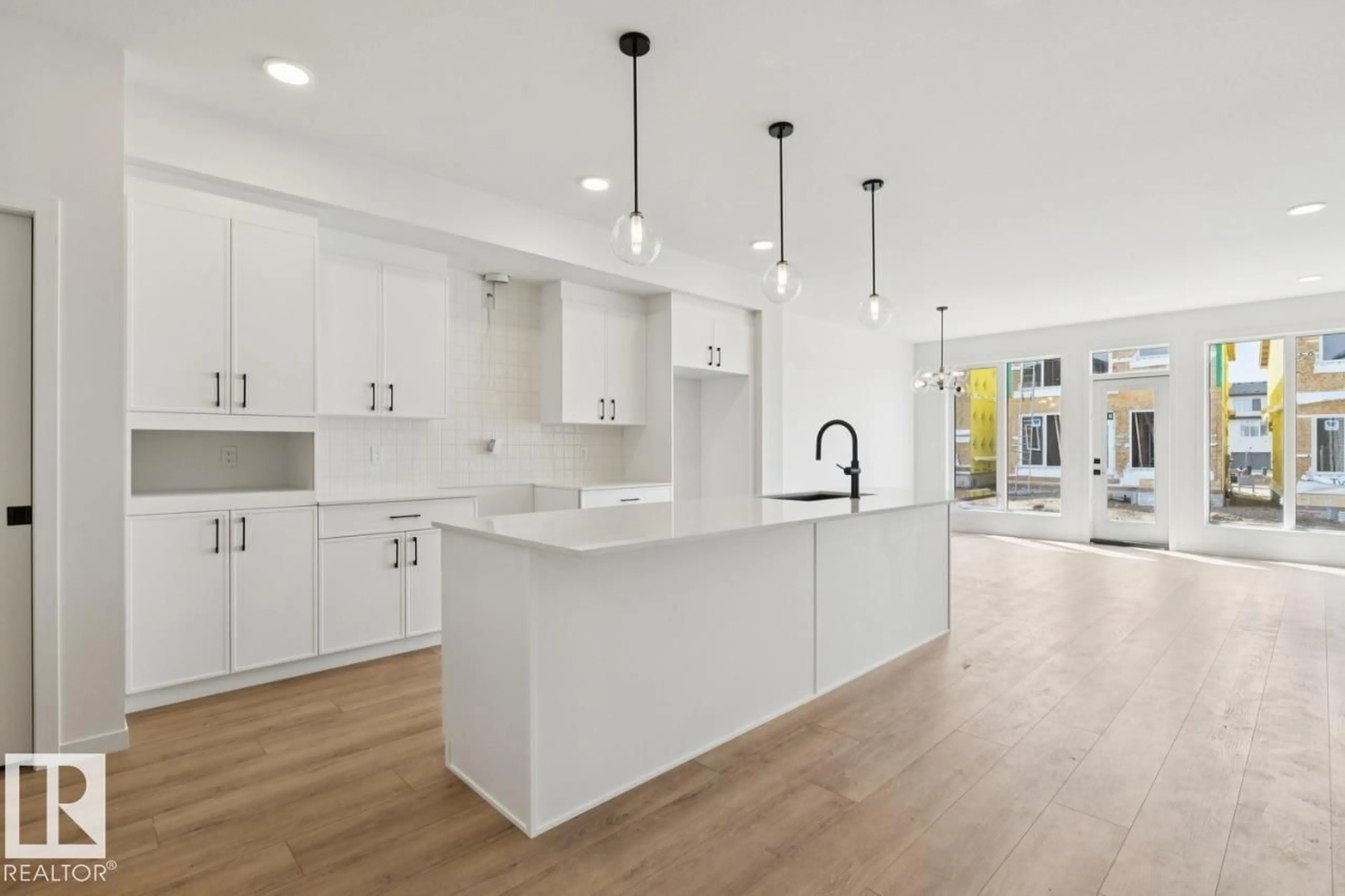 Open concept kitchen, ceramic/tile floor for 428 30 ST, Edmonton Alberta T6X1A5