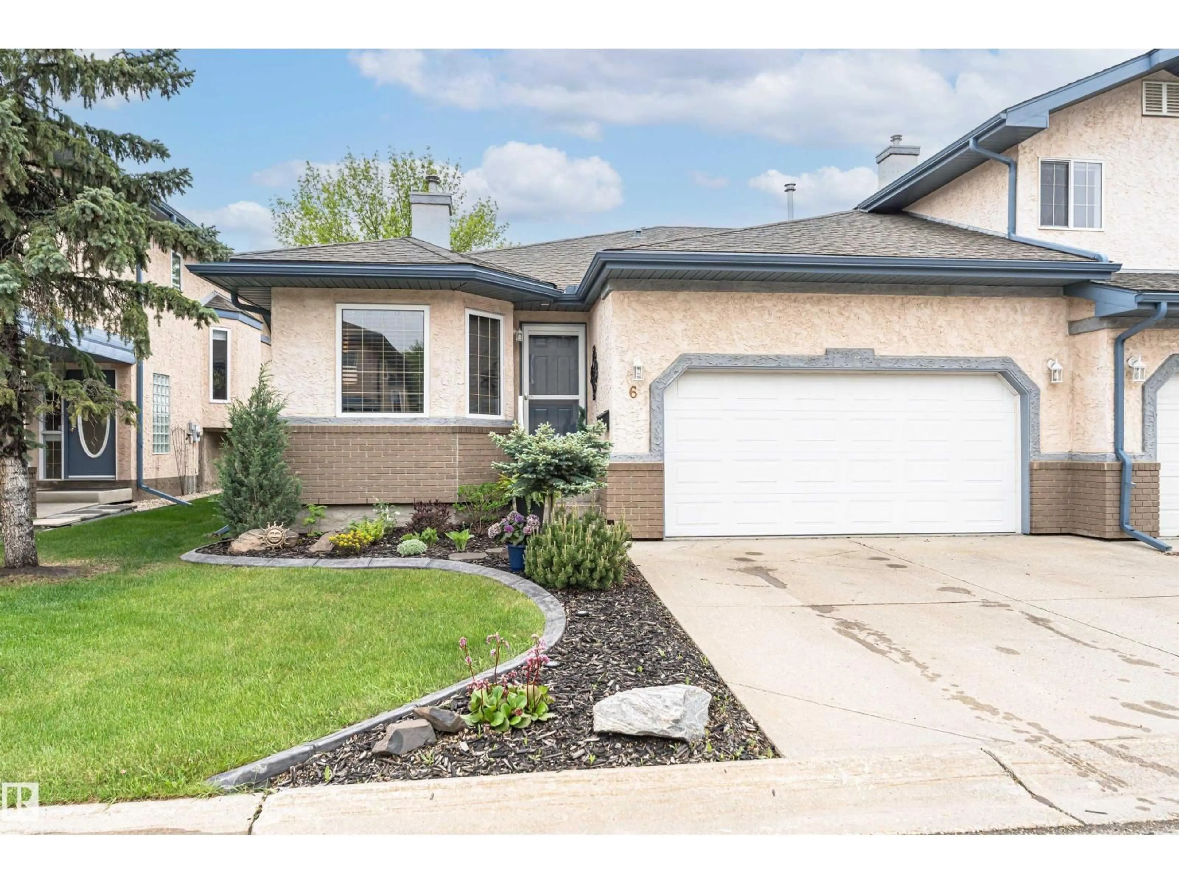 Home with vinyl exterior material, street for 6 ESTATES CO, Sherwood Park Alberta T6B1M9
