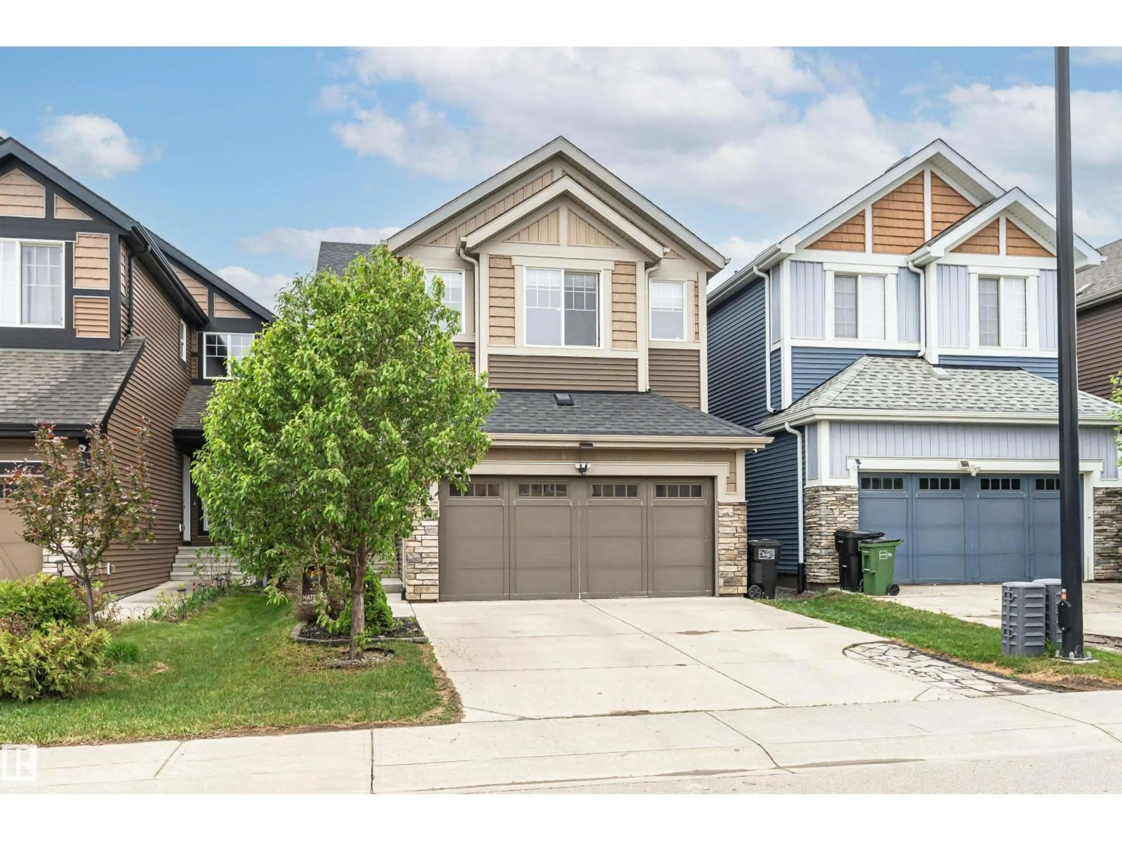 Home with vinyl exterior material, street for 8744 223 ST, Edmonton Alberta T5T7L6