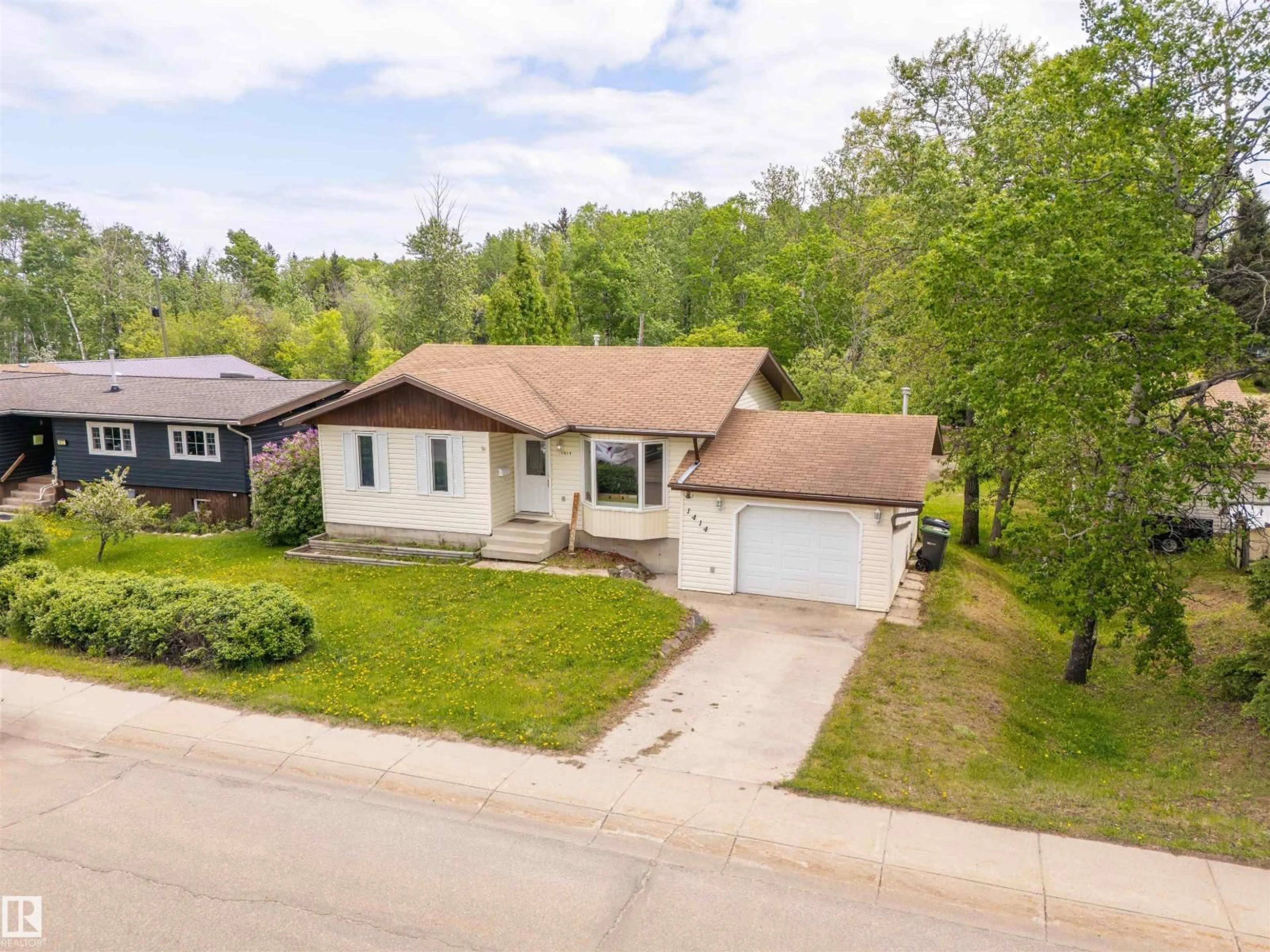A pic from outside/outdoor area/front of a property/back of a property/a pic from drone, street for 1414 7 ST, Cold Lake Alberta T9M1L3