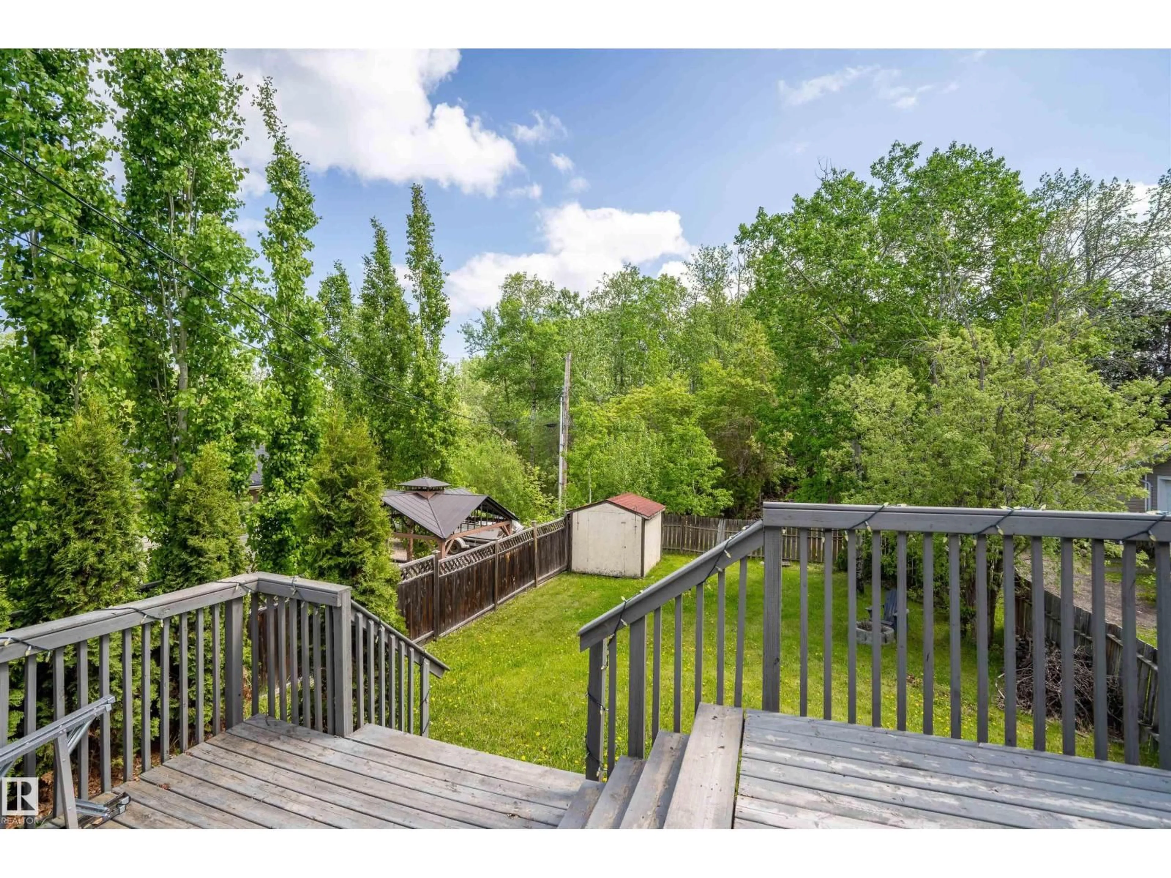 A pic from outside/outdoor area/front of a property/back of a property/a pic from drone, forest/trees view for 1414 7 ST, Cold Lake Alberta T9M1L3