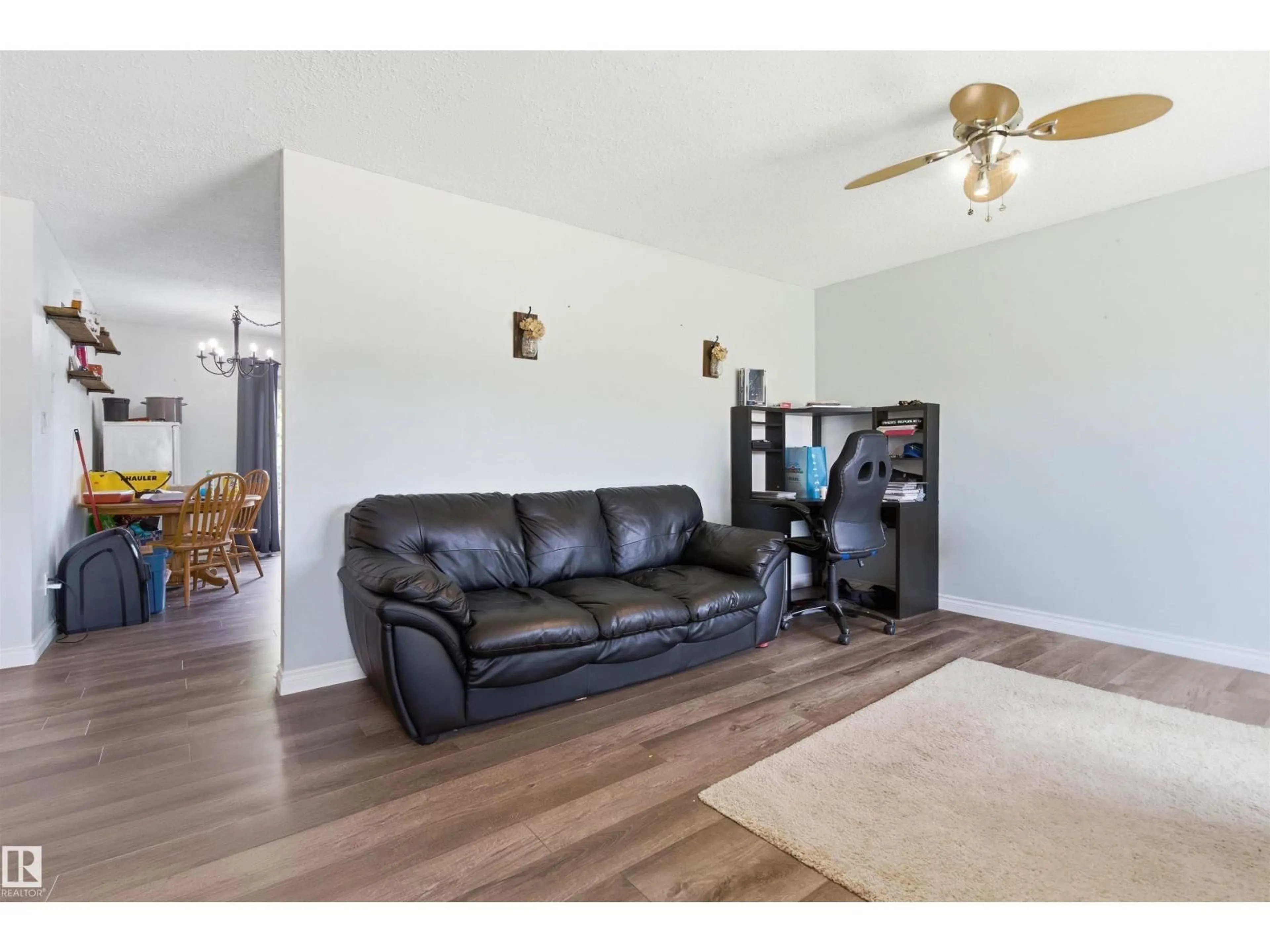 Living room with furniture, wood/laminate floor for 1414 7 ST, Cold Lake Alberta T9M1L3