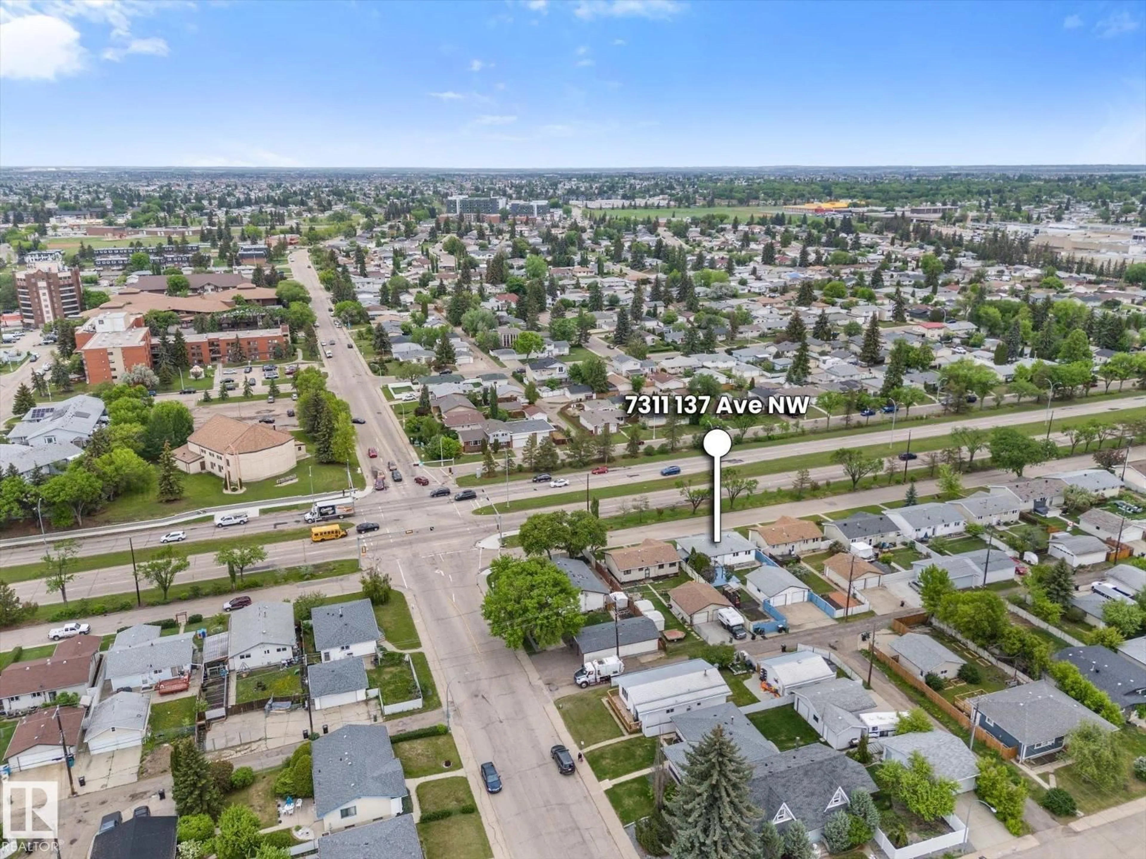 A pic from outside/outdoor area/front of a property/back of a property/a pic from drone, street for 7311 137 AV, Edmonton Alberta T5C2L4
