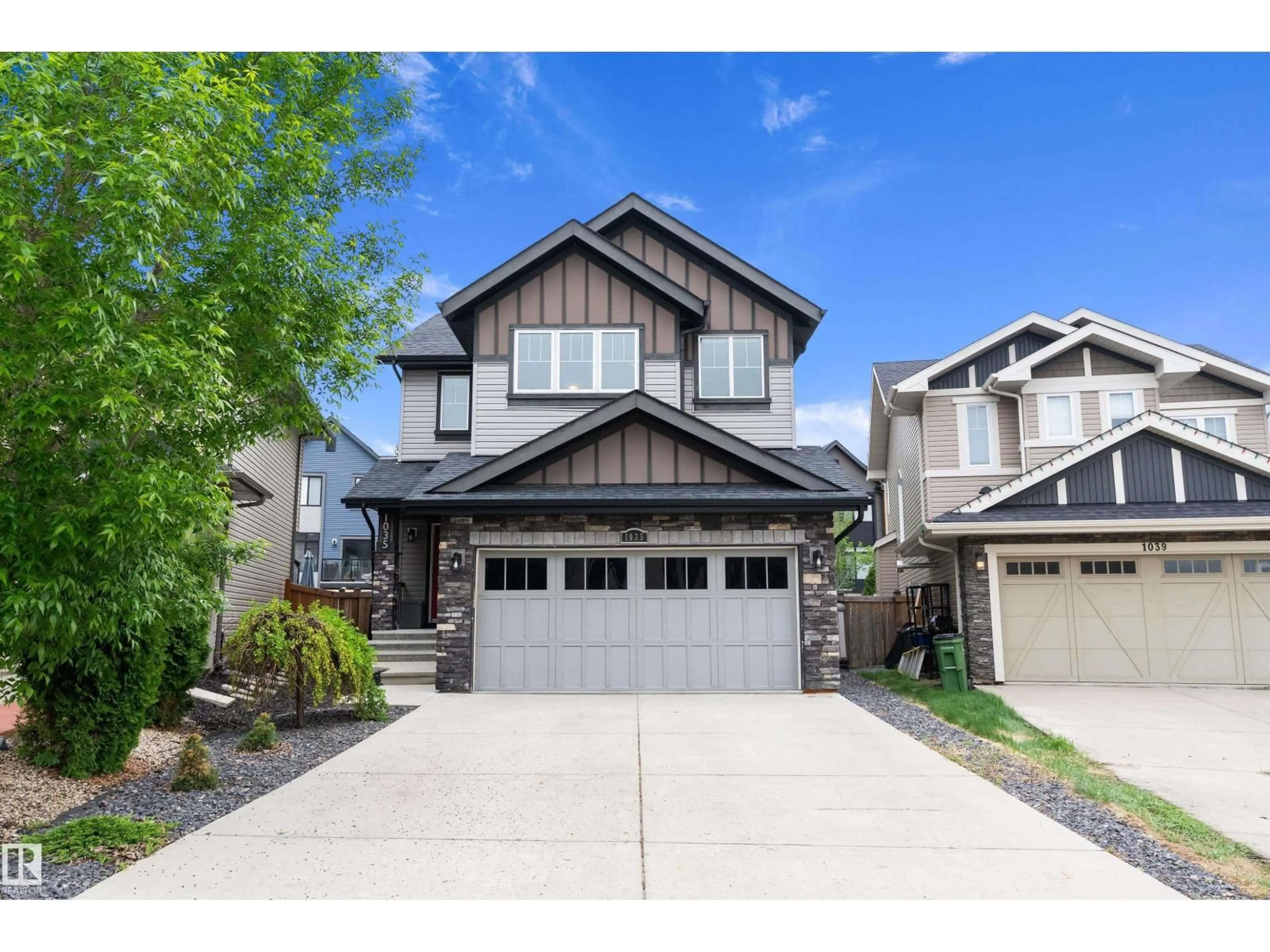 Home with vinyl exterior material, street for SW - 1035 158 ST, Edmonton Alberta T6W2S4