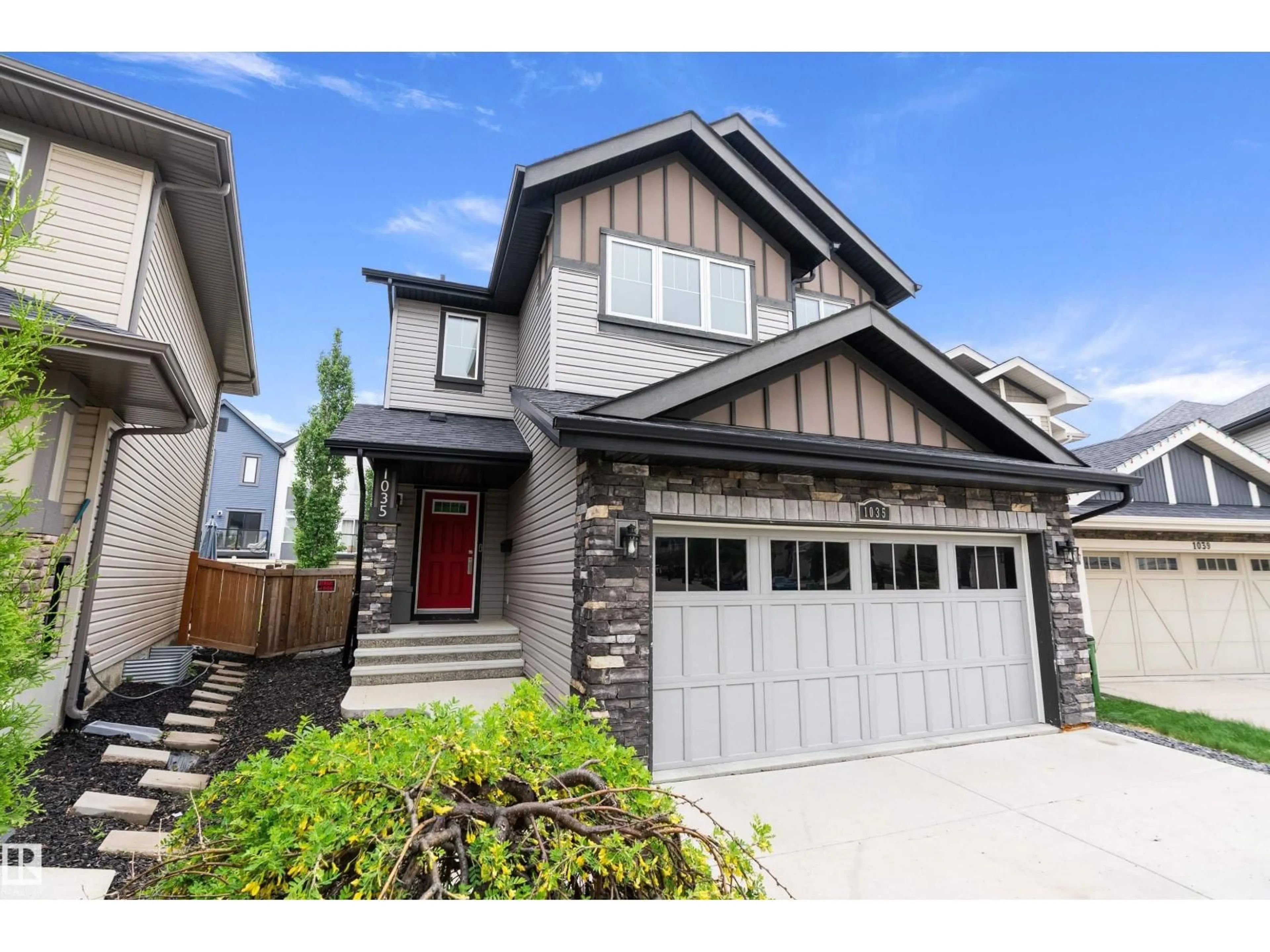 Home with vinyl exterior material, street for SW - 1035 158 ST, Edmonton Alberta T6W2S4