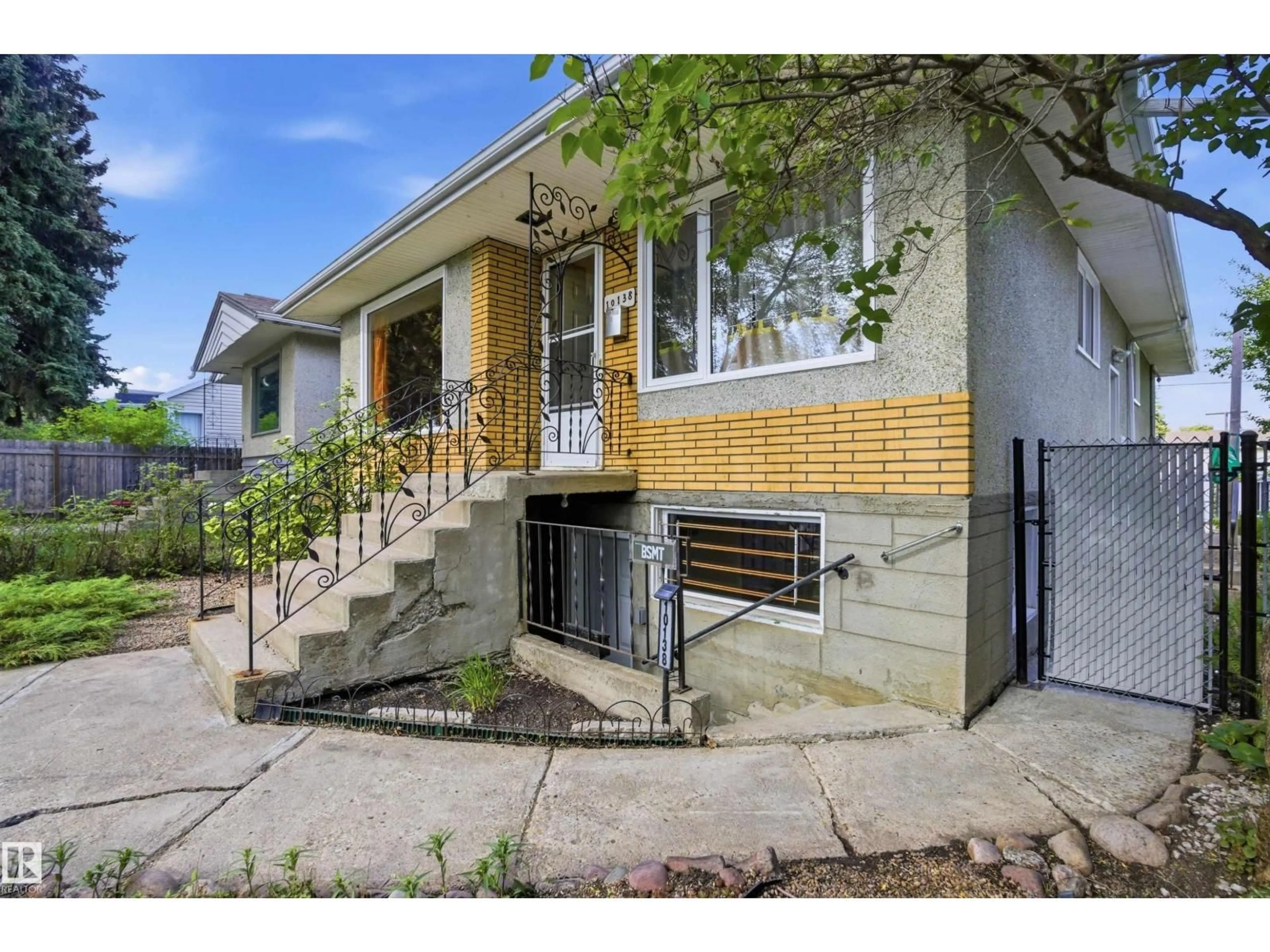 Home with brick exterior material, street for 10138 74 ST, Edmonton Alberta T6H2X9