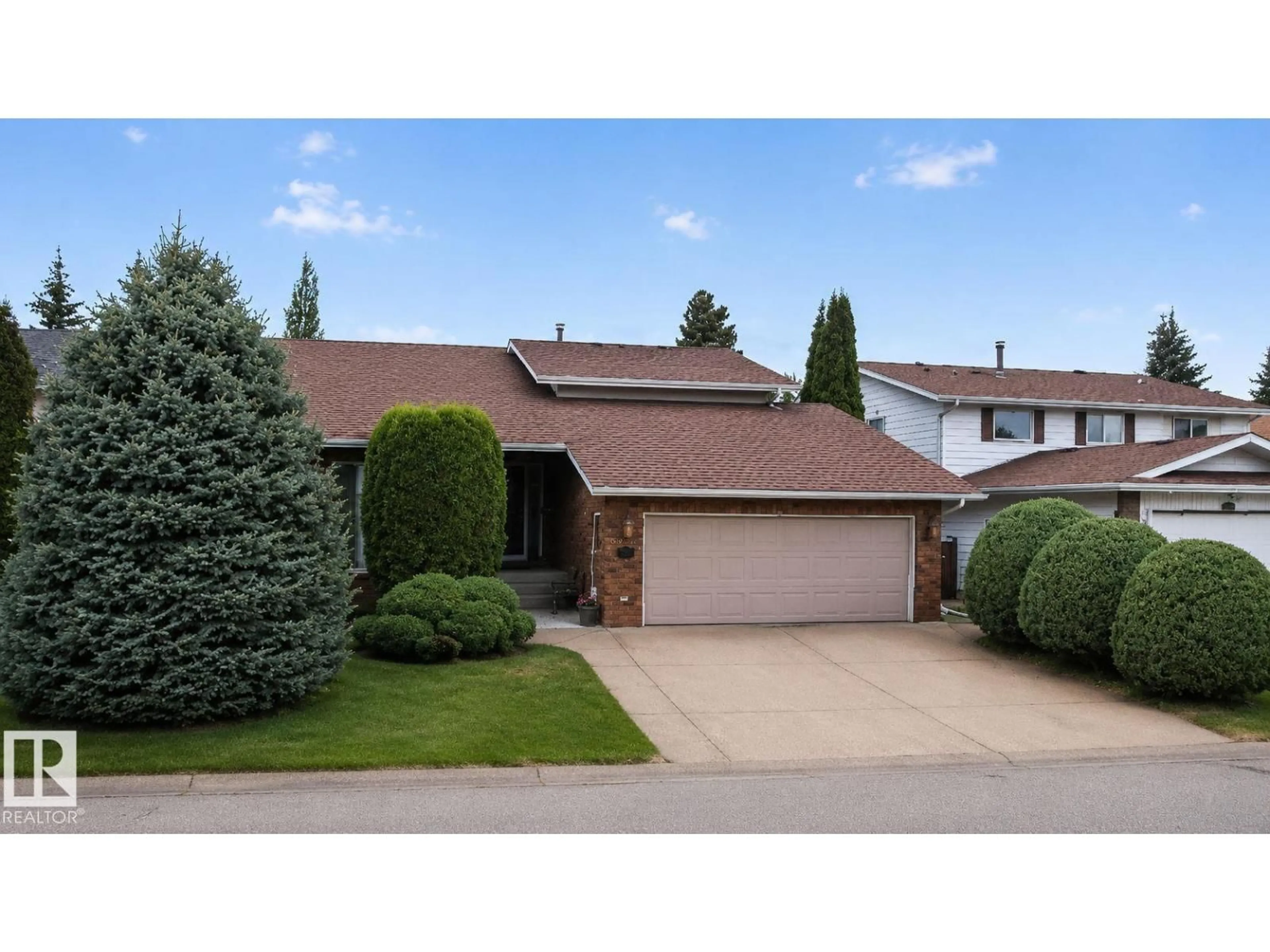 Home with vinyl exterior material, street for NW - 2332 113A ST, Edmonton Alberta T6J4Y2