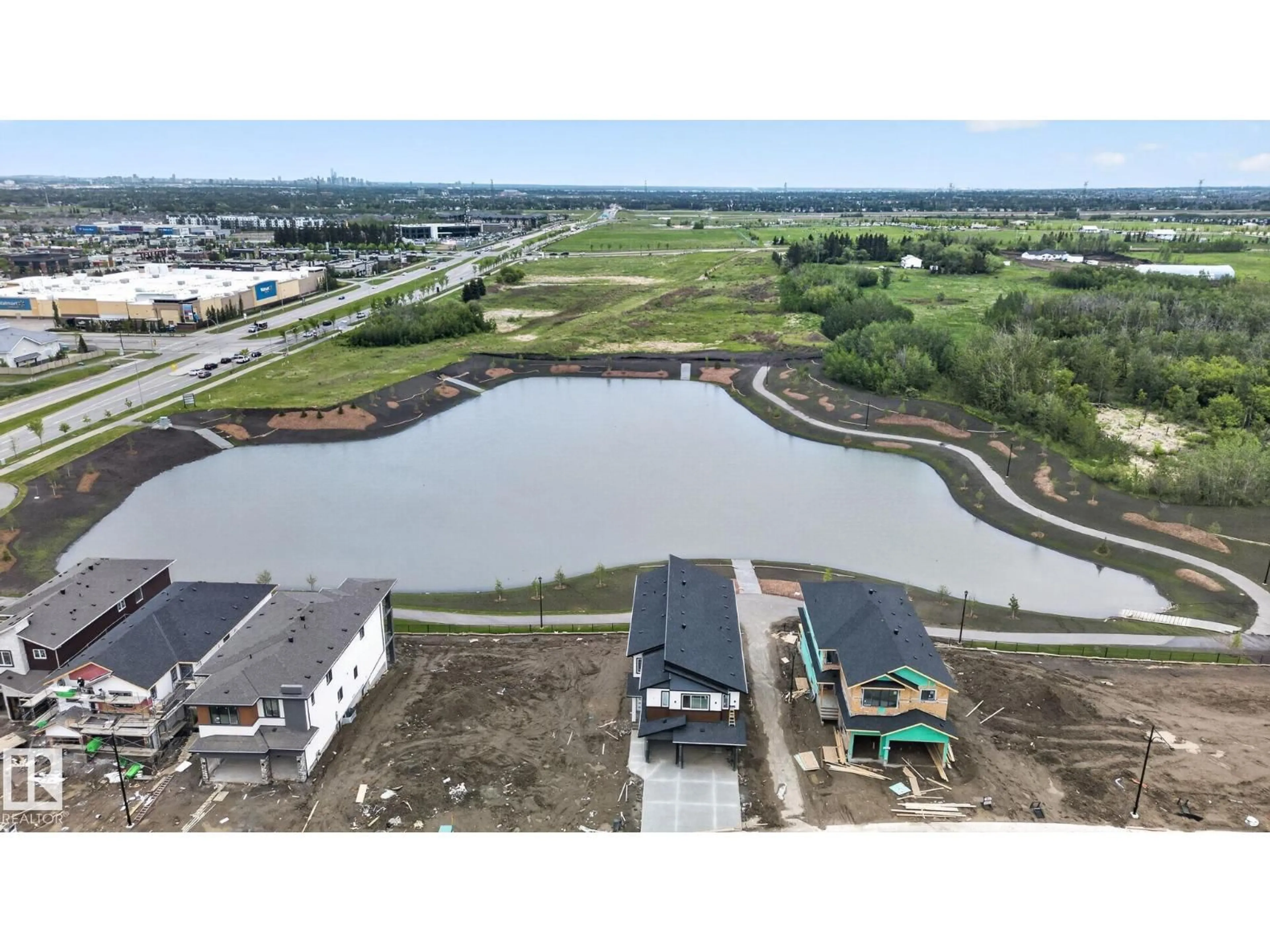 A pic from outside/outdoor area/front of a property/back of a property/a pic from drone, water/lake/river/ocean view for 4627 17 AV, Edmonton Alberta T6X1Y4