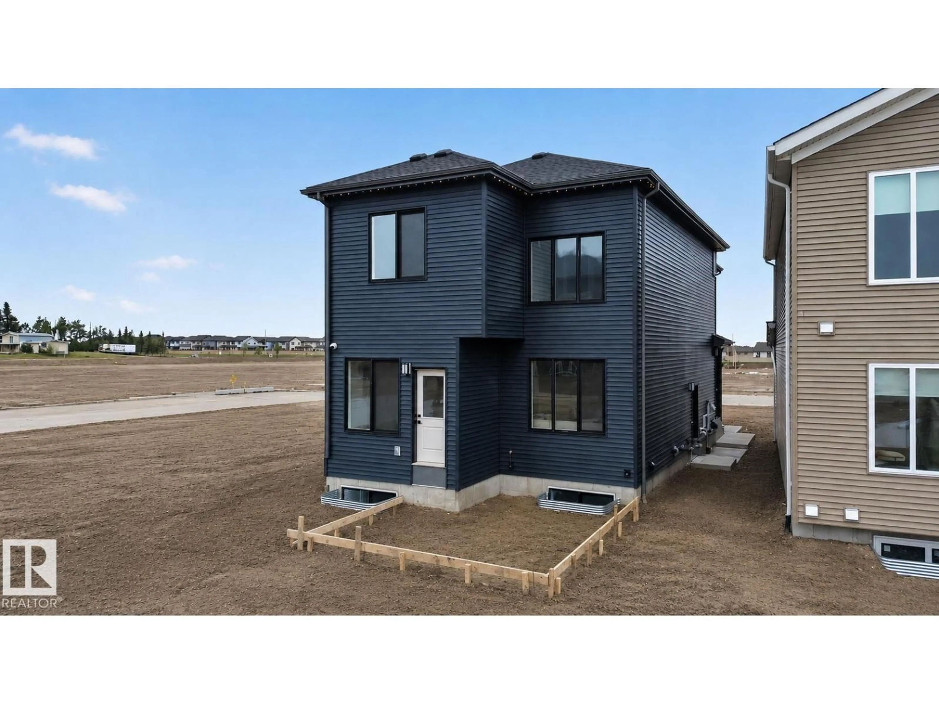 Home with vinyl exterior material, building for 4627 17 AV, Edmonton Alberta T6X1Y4