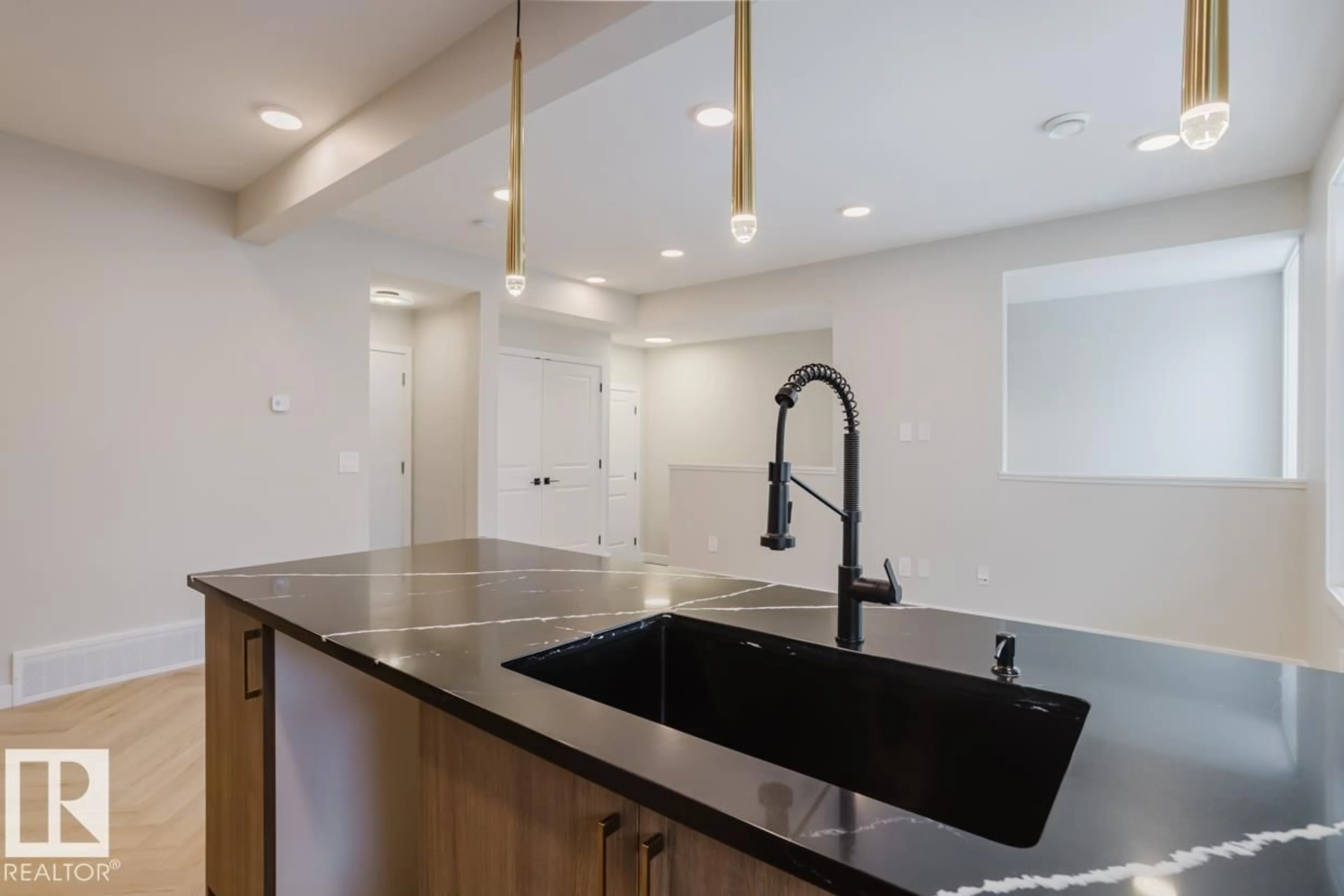 Open concept kitchen, unknown for #11 - 16231 19 AV, Edmonton Alberta T6W5C6