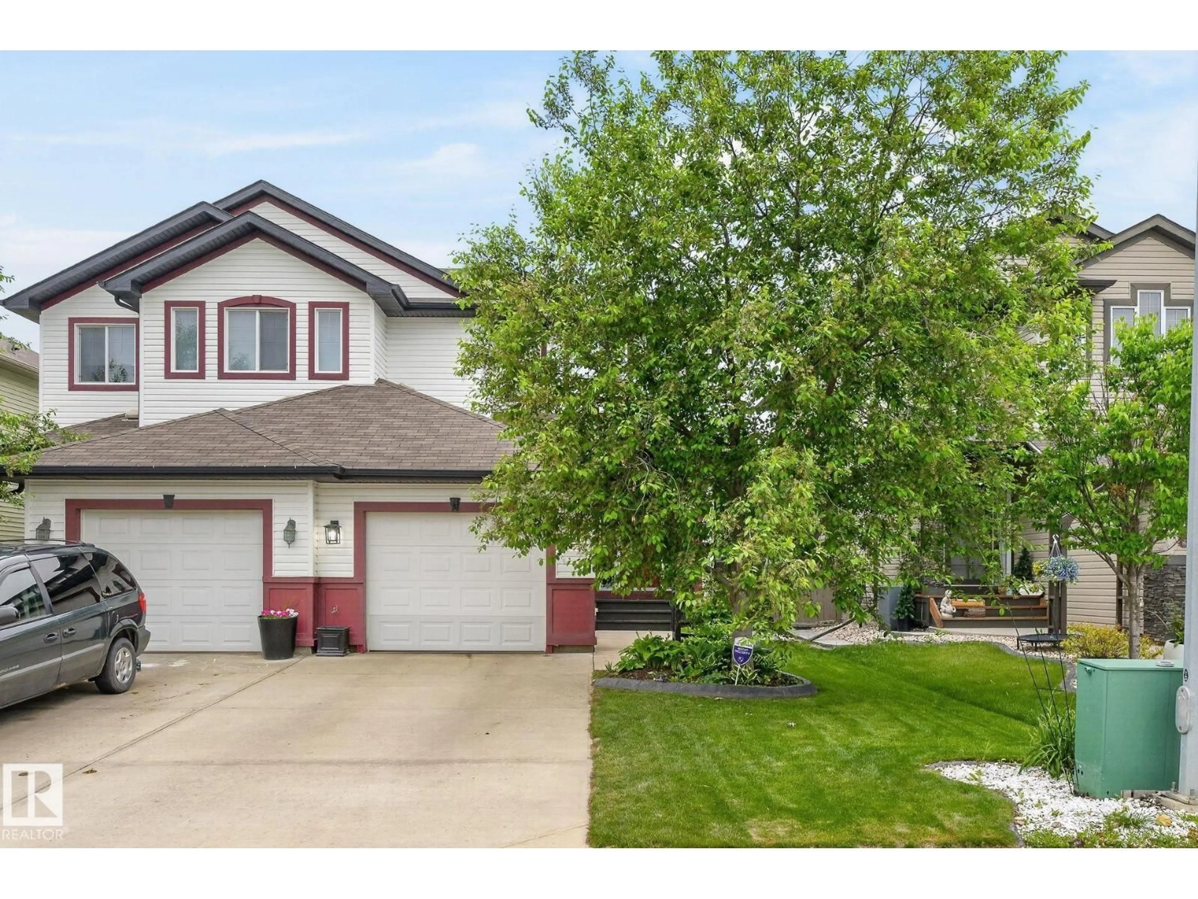 Home with vinyl exterior material, street for 64 SOUTH CREEK WD, Stony Plain Alberta T7Z0E1