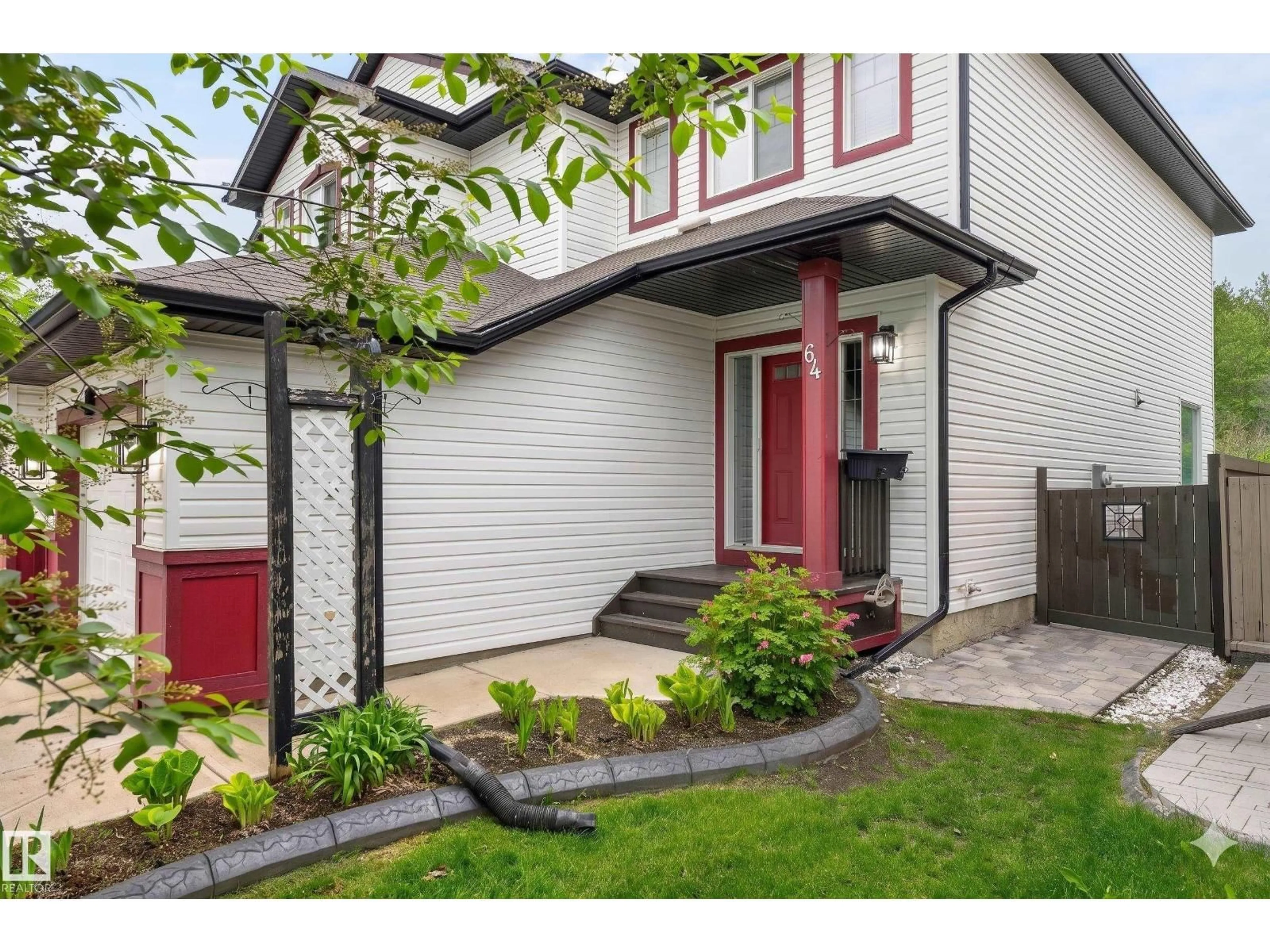 Home with brick exterior material, street for 64 SOUTH CREEK WD, Stony Plain Alberta T7Z0E1