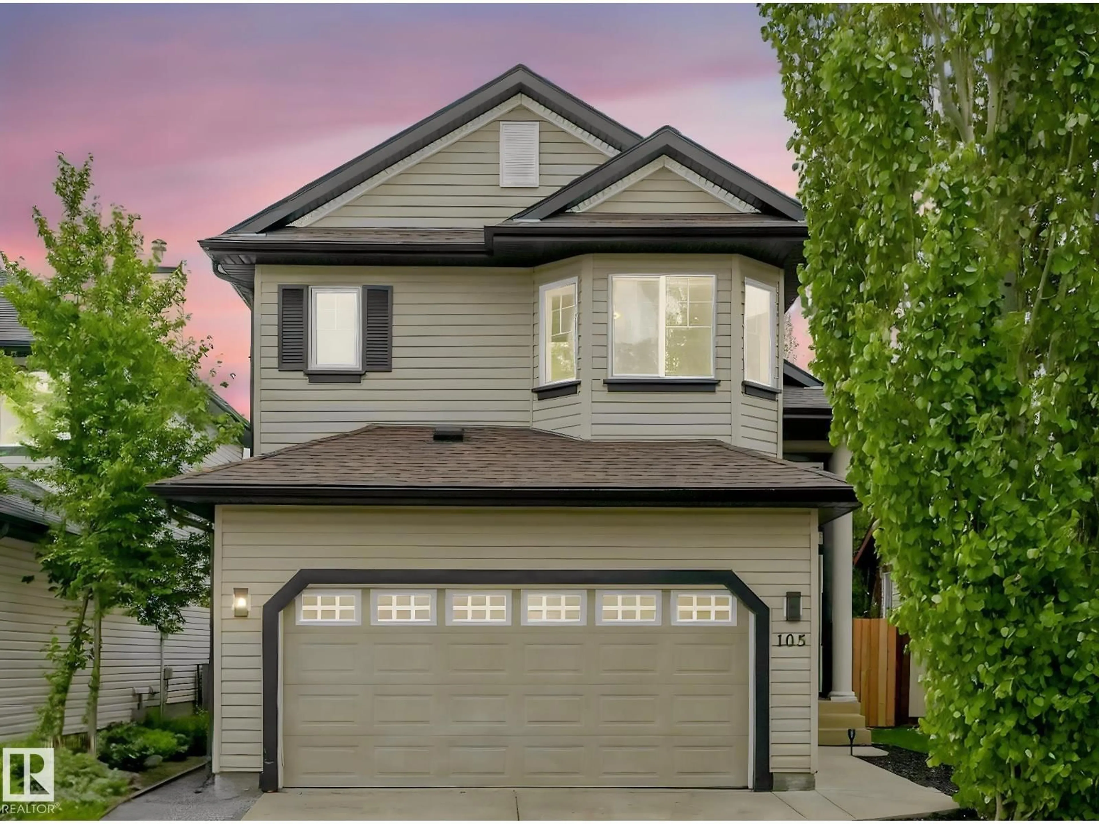 Home with vinyl exterior material, street for 105 RUE MOREAU, Beaumont Alberta T4X1T1