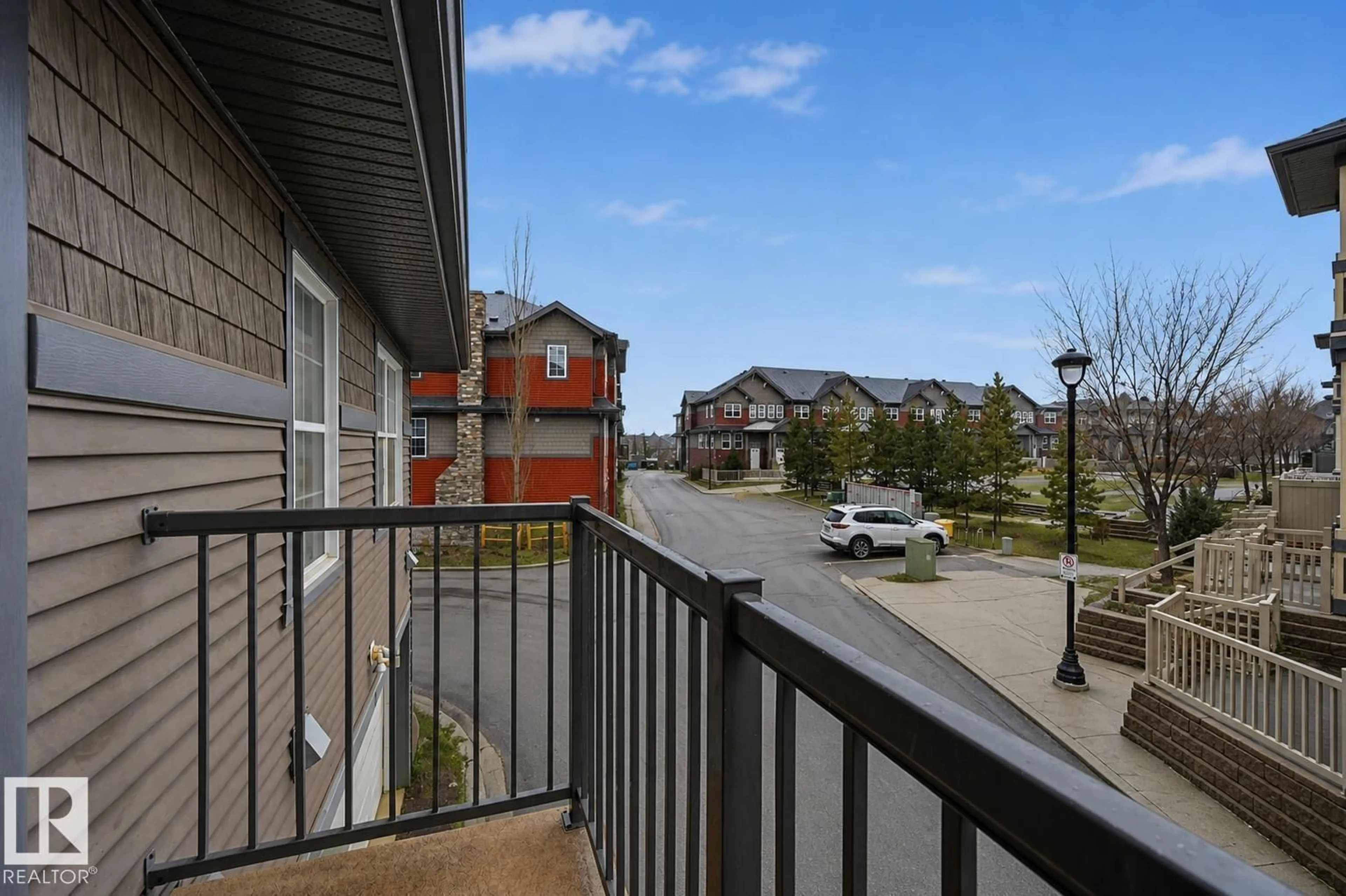 Patio, city buildings view from balcony for 4033 ORCHARDS DR, Edmonton Alberta T6X1V2