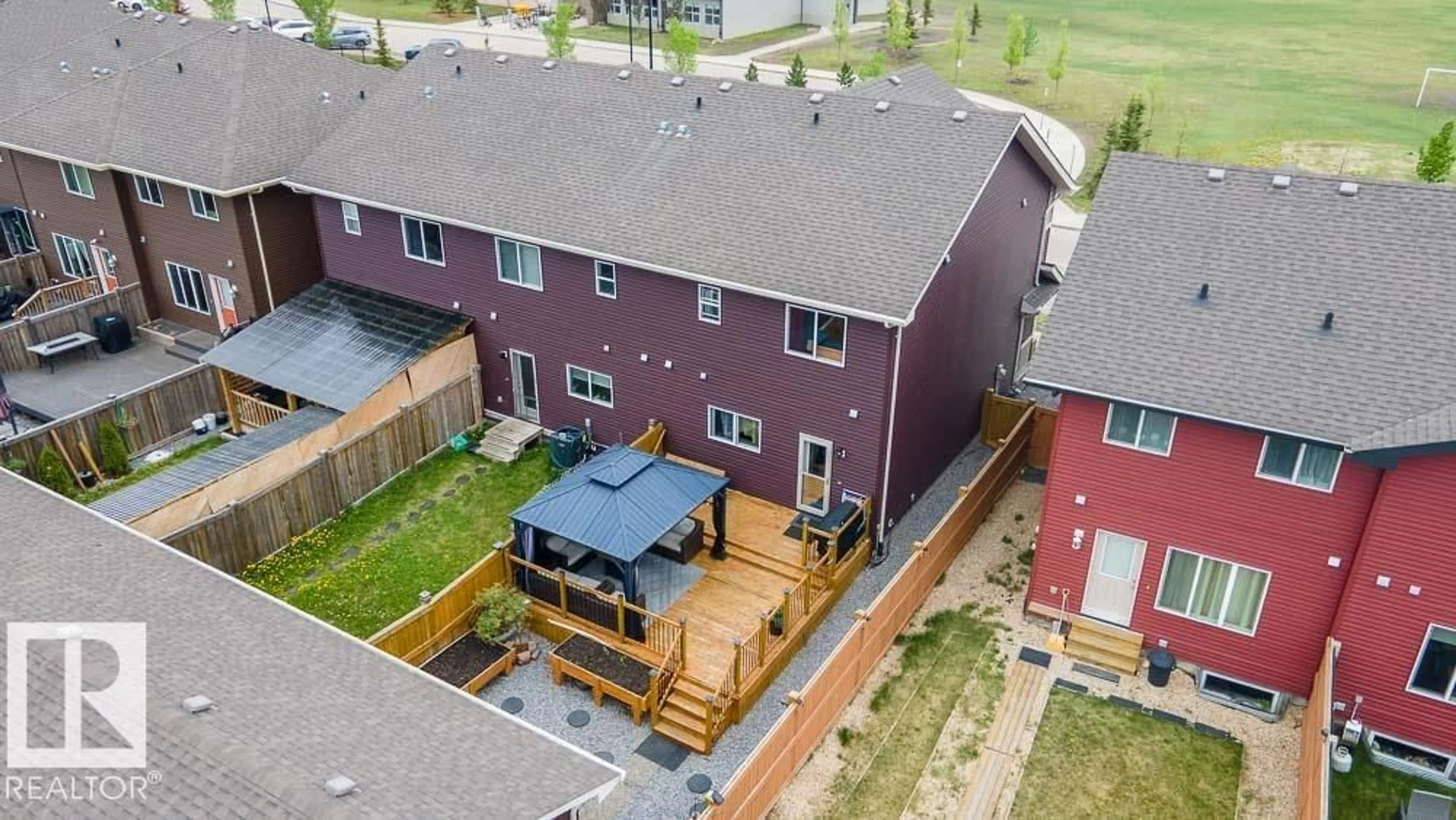 A pic from outside/outdoor area/front of a property/back of a property/a pic from drone, unknown for 405 ORCHARDS BV, Edmonton Alberta T6X2E1