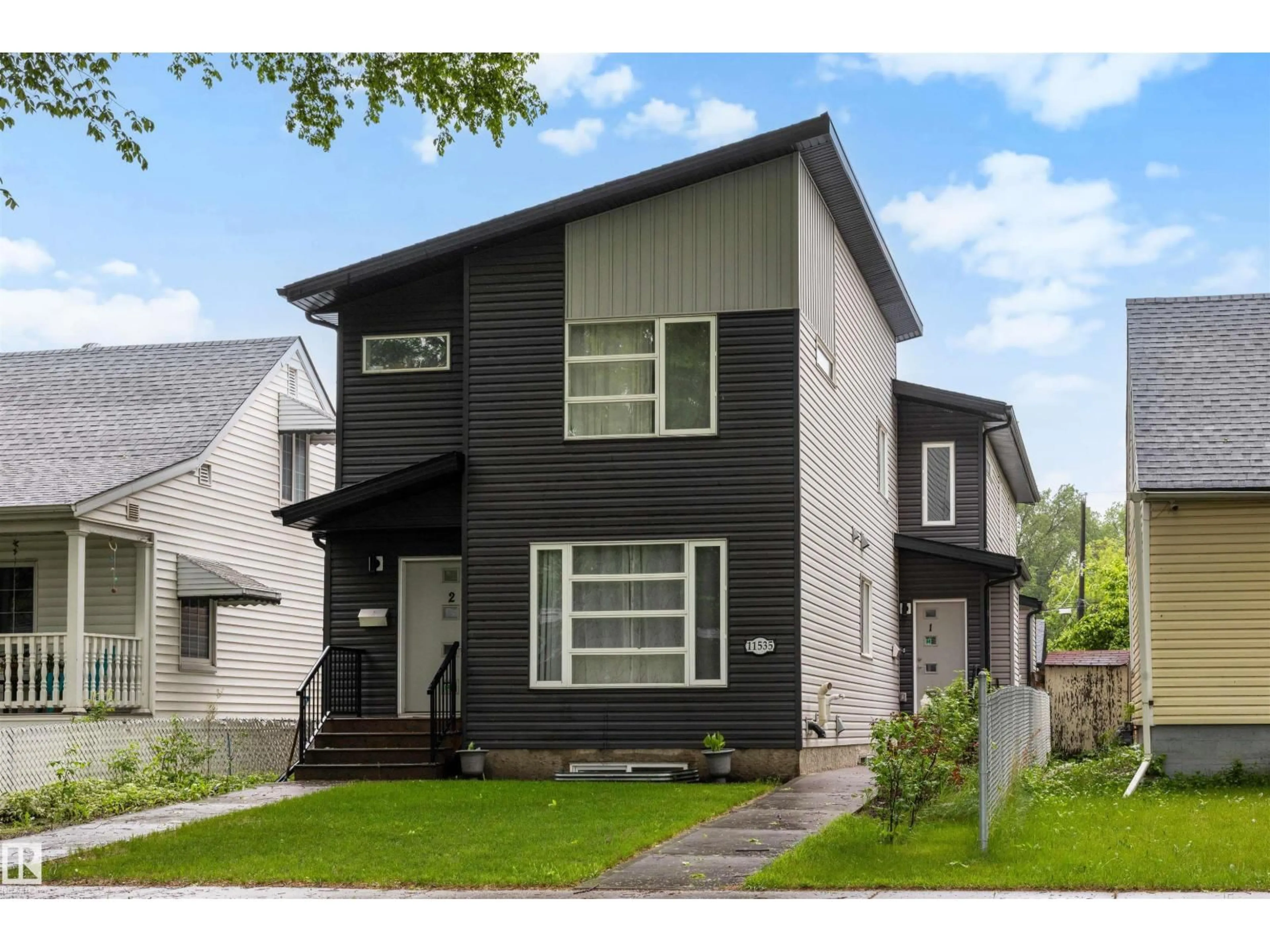 Home with vinyl exterior material, street for 11535 88 ST, Edmonton Alberta T5B3R2