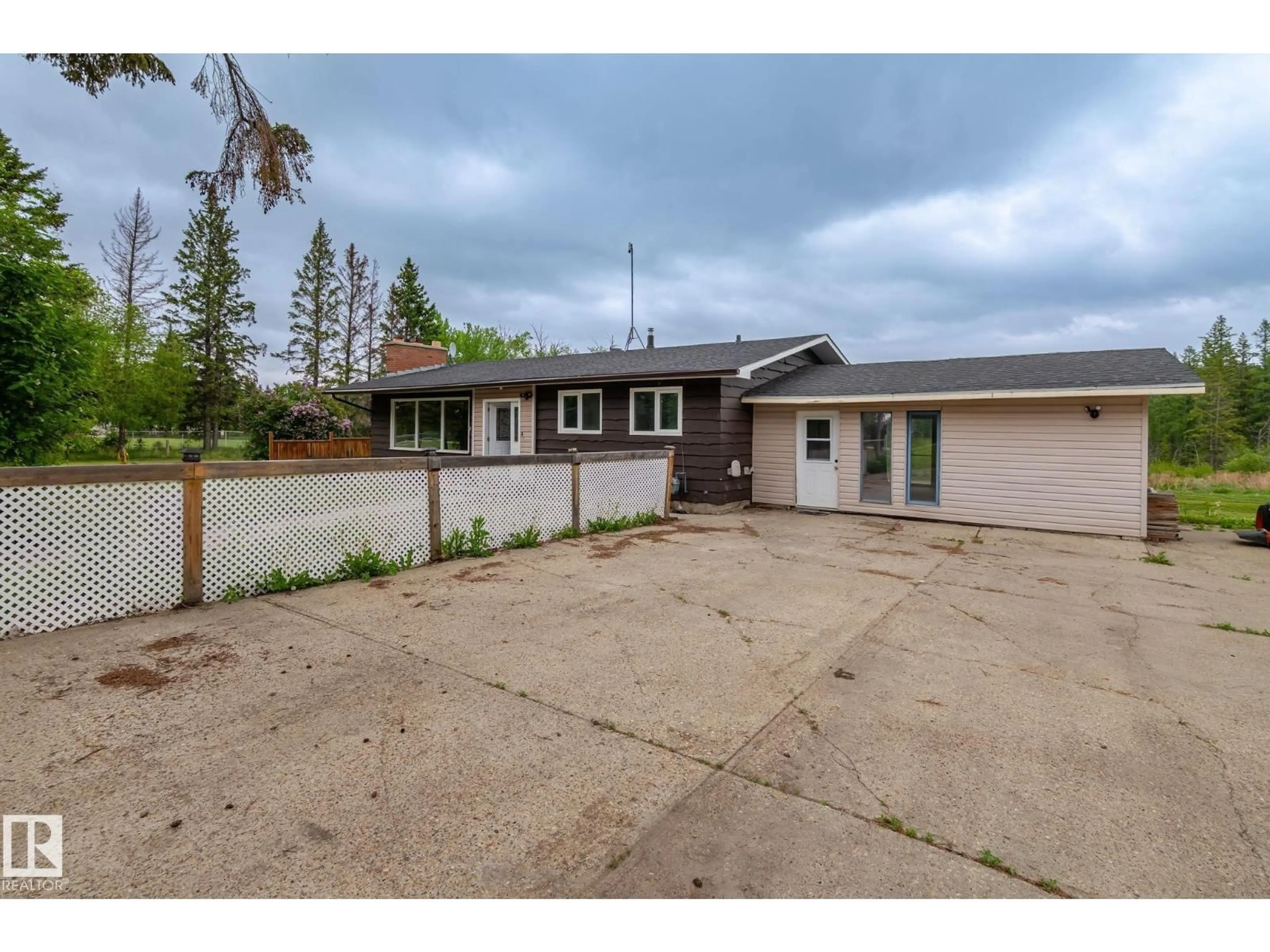 A pic from outside/outdoor area/front of a property/back of a property/a pic from drone, street for 10915 SPRUCE VALLEY RD, Rural Parkland County Alberta T7X6E5