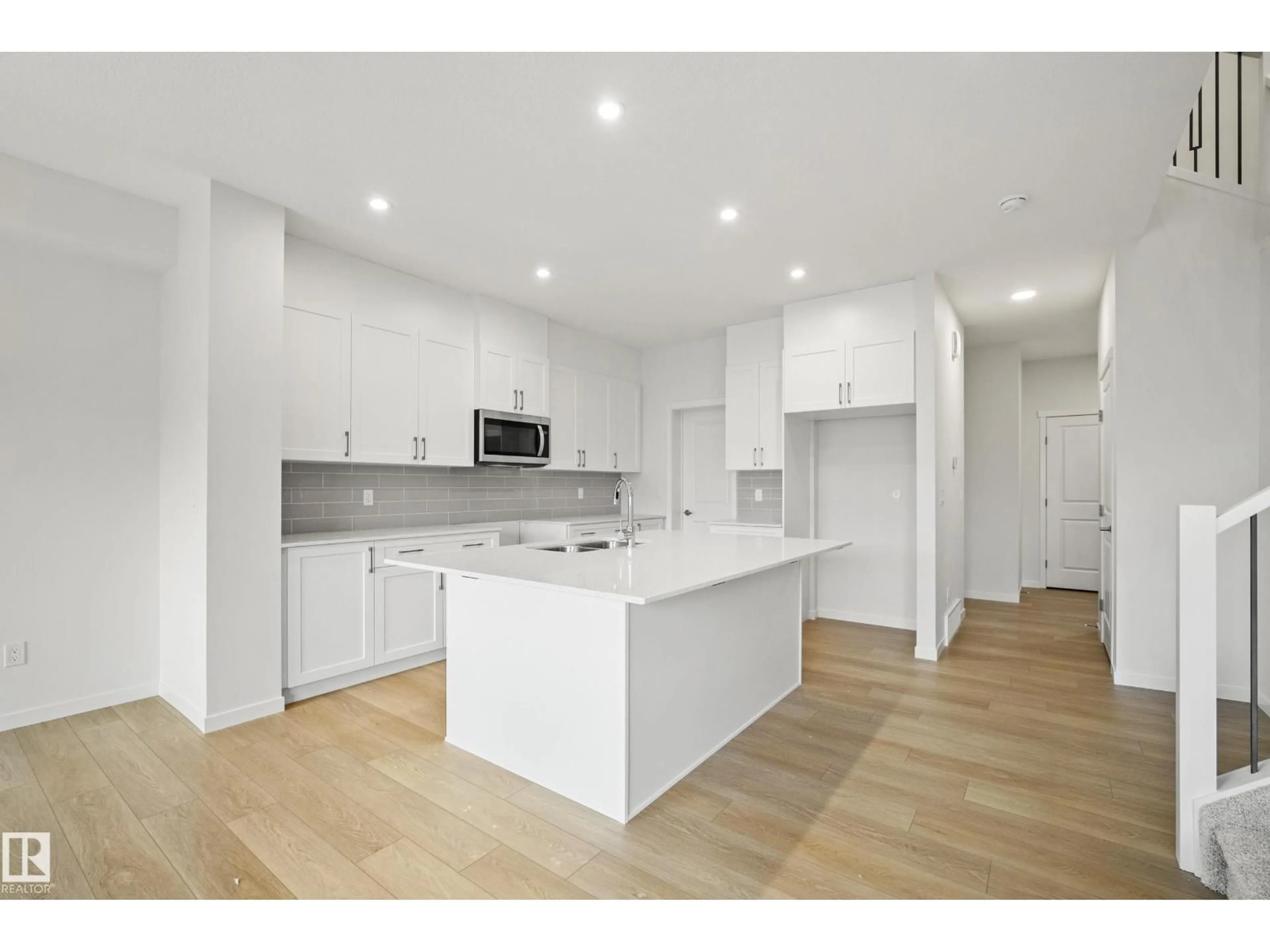 Open concept kitchen, unknown for NW - 20731 24 AV, Edmonton Alberta T6M2C4