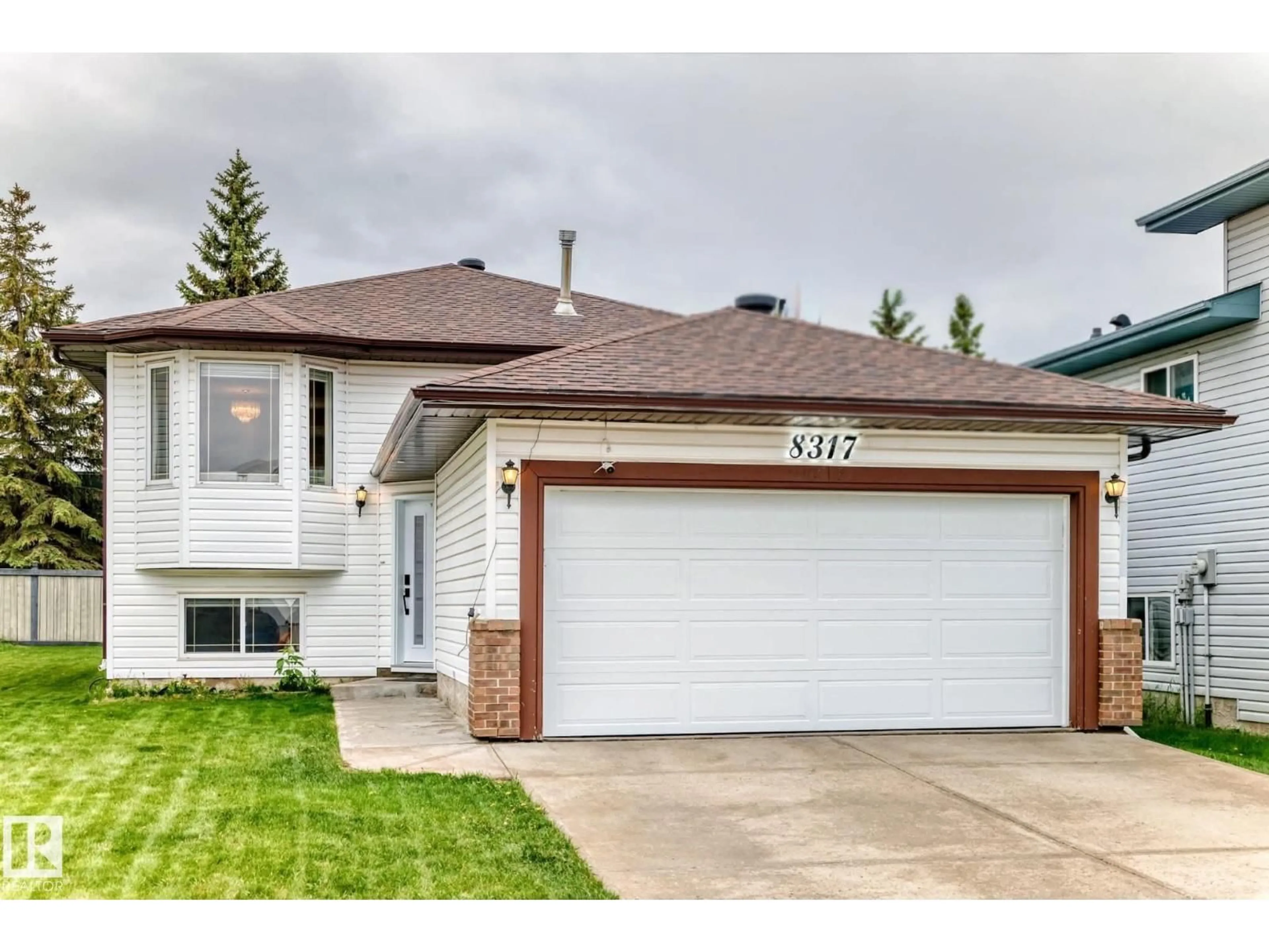 Home with vinyl exterior material, street for NW - 8317 160A AV, Edmonton Alberta T5Z3G4