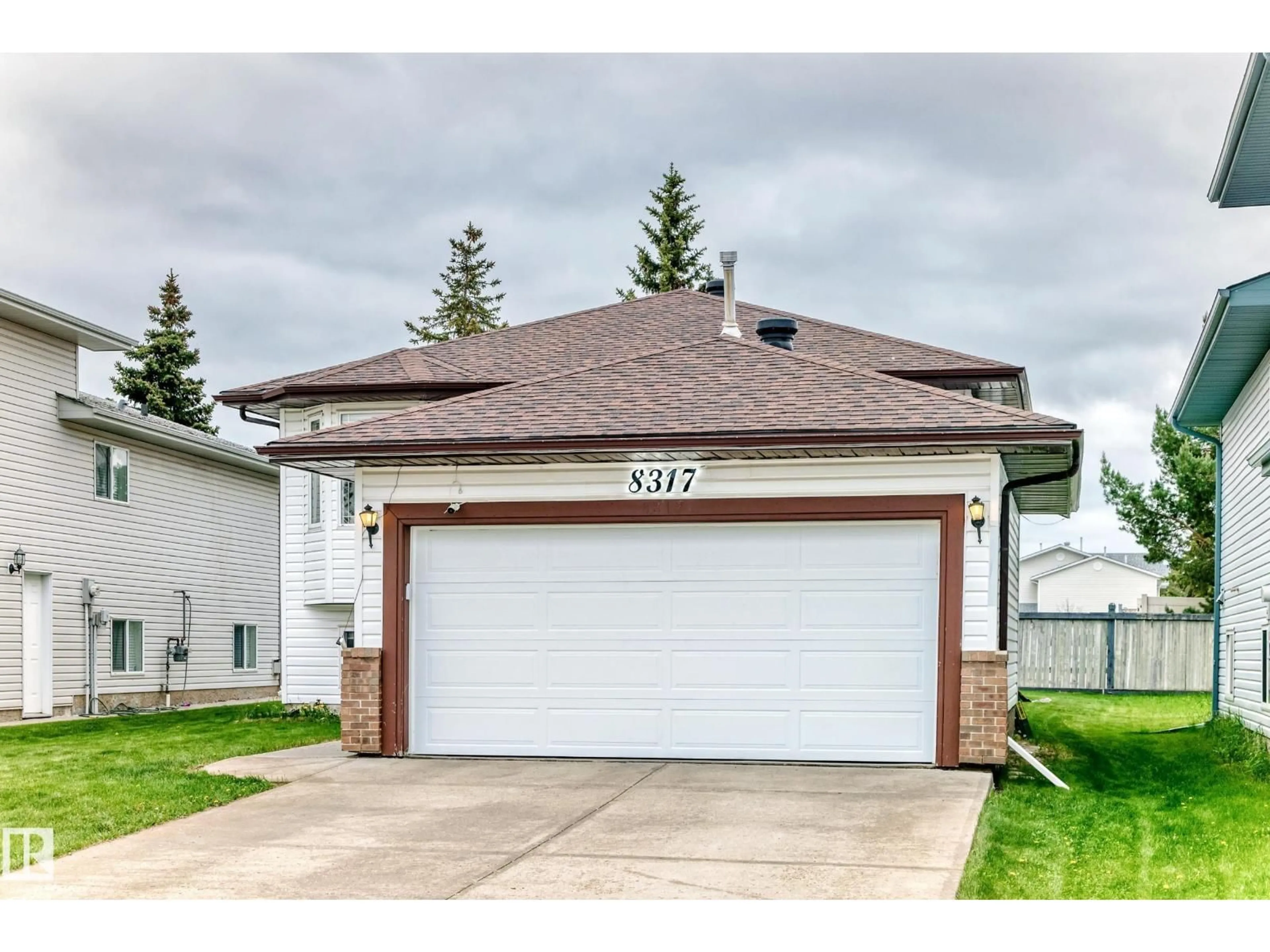 Home with vinyl exterior material, street for NW - 8317 160A AV, Edmonton Alberta T5Z3G4