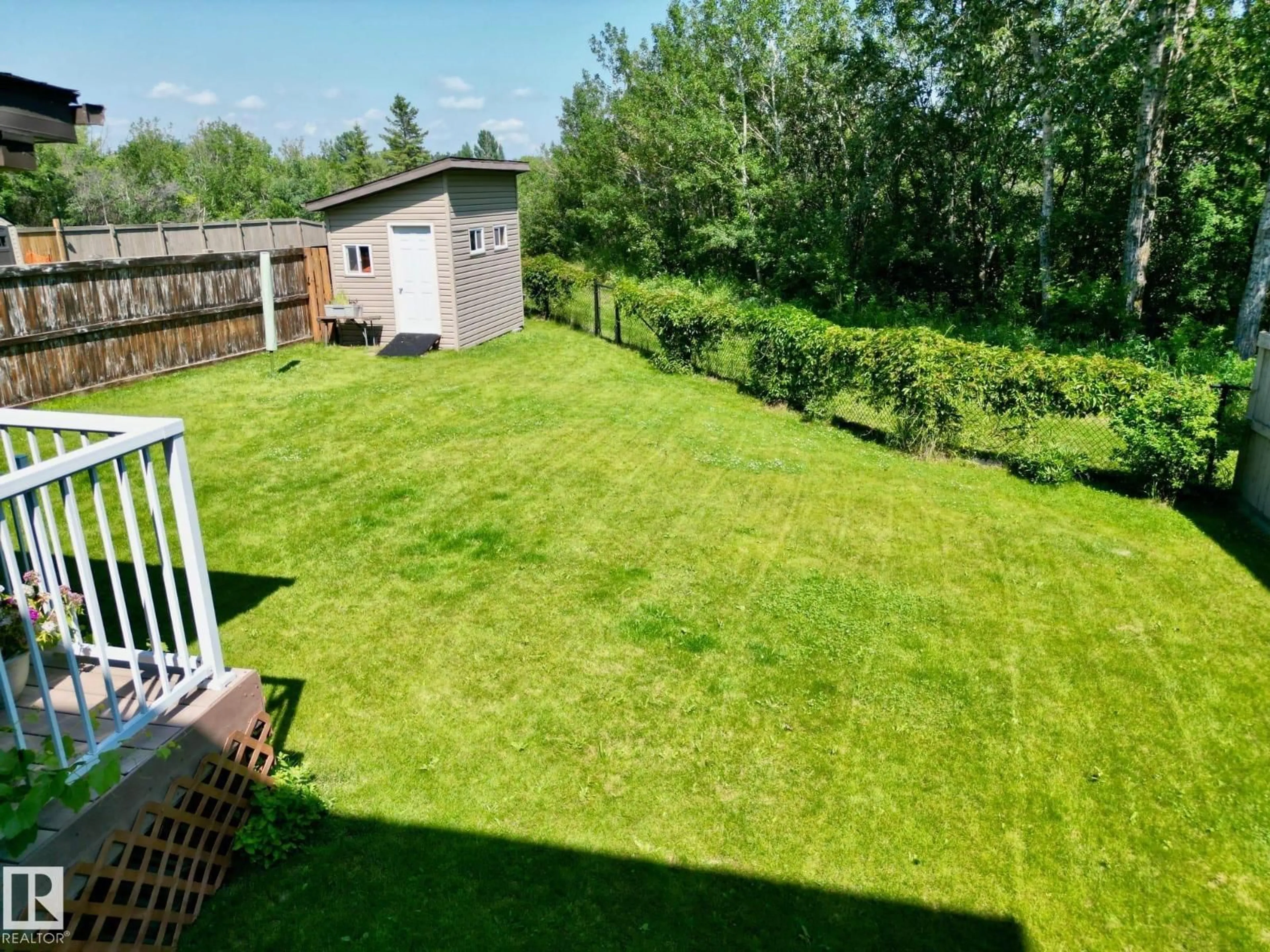 A pic from outside/outdoor area/front of a property/back of a property/a pic from drone, forest/trees view for 57 HOMESTEAD CRESCENT, Edmonton Alberta T5A2Y1