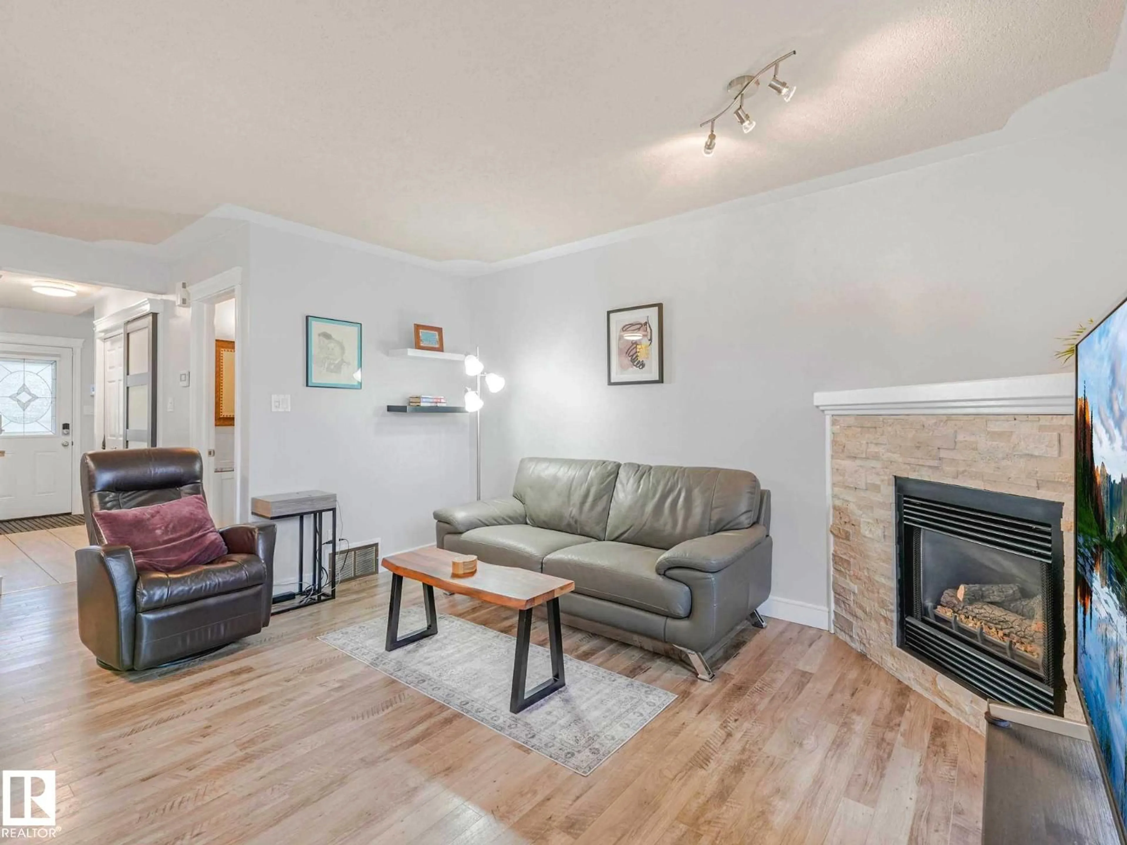 Living room with furniture, wood/laminate floor for #35 - 15215 126 ST, Edmonton Alberta T5X5Z3
