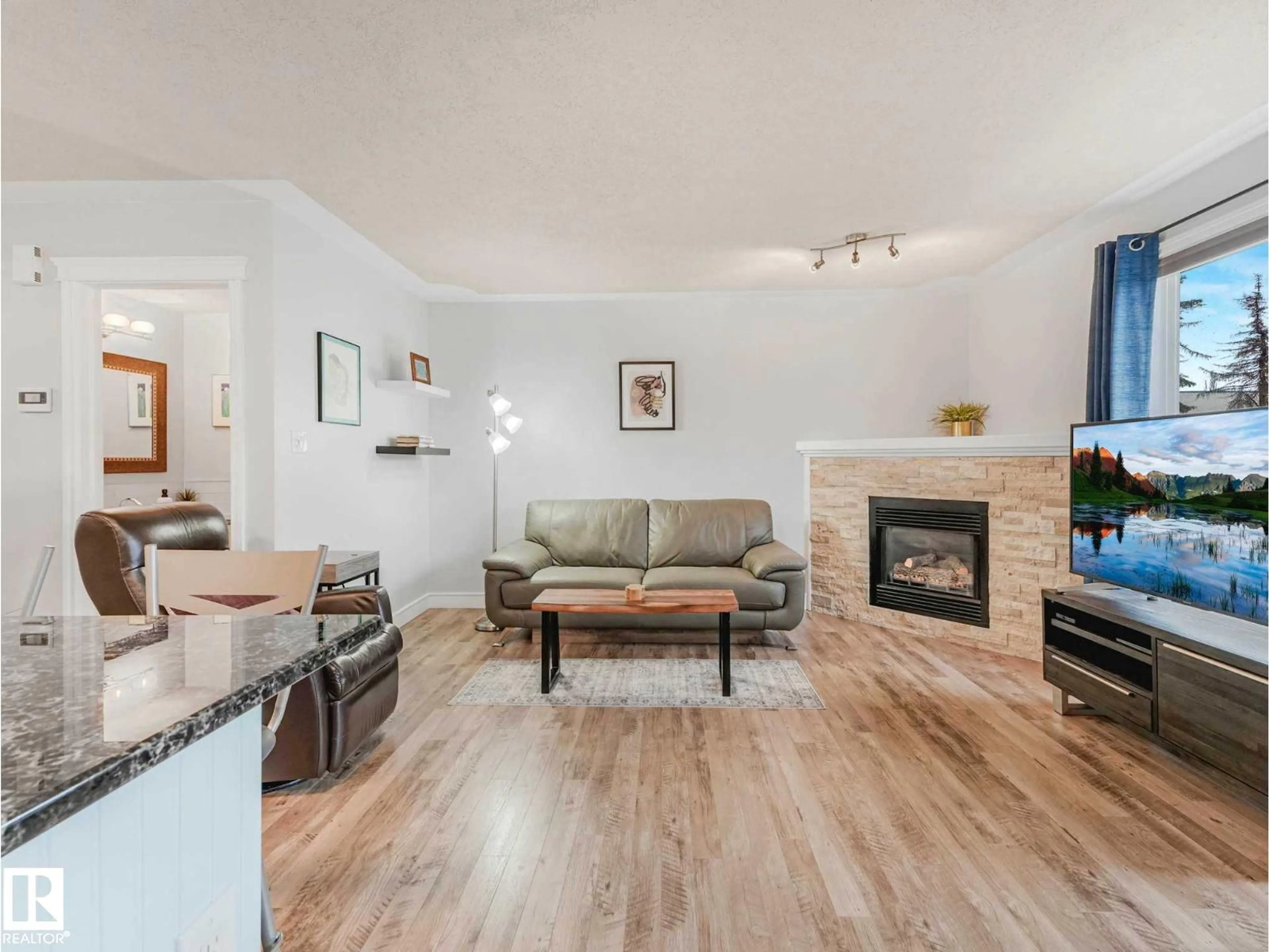Living room with furniture, wood/laminate floor for #35 - 15215 126 ST, Edmonton Alberta T5X5Z3