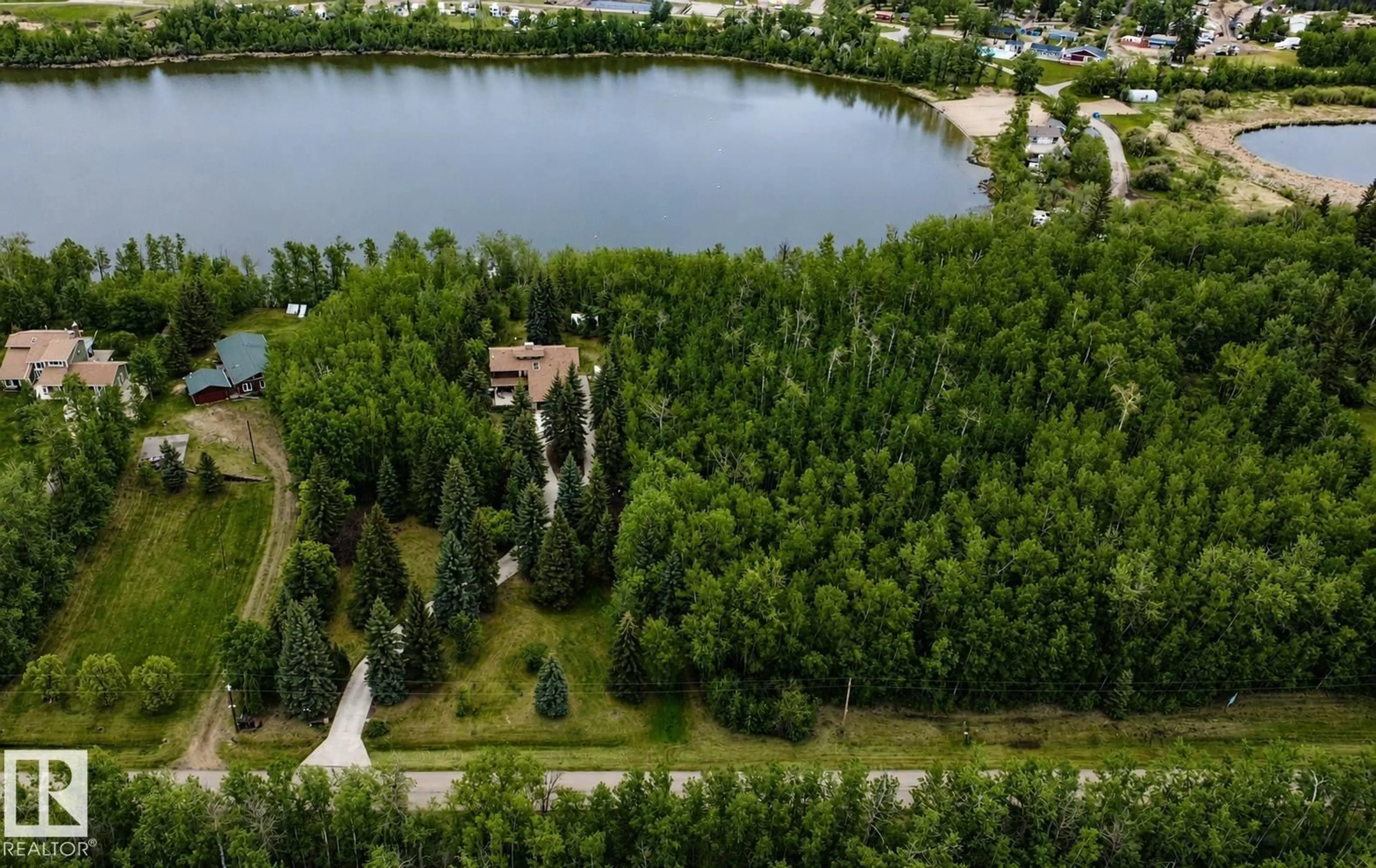 A pic from outside/outdoor area/front of a property/back of a property/a pic from drone, water/lake/river/ocean view for 25 21546 TWP ROAD 520, Rural Strathcona County Alberta T8E1G5
