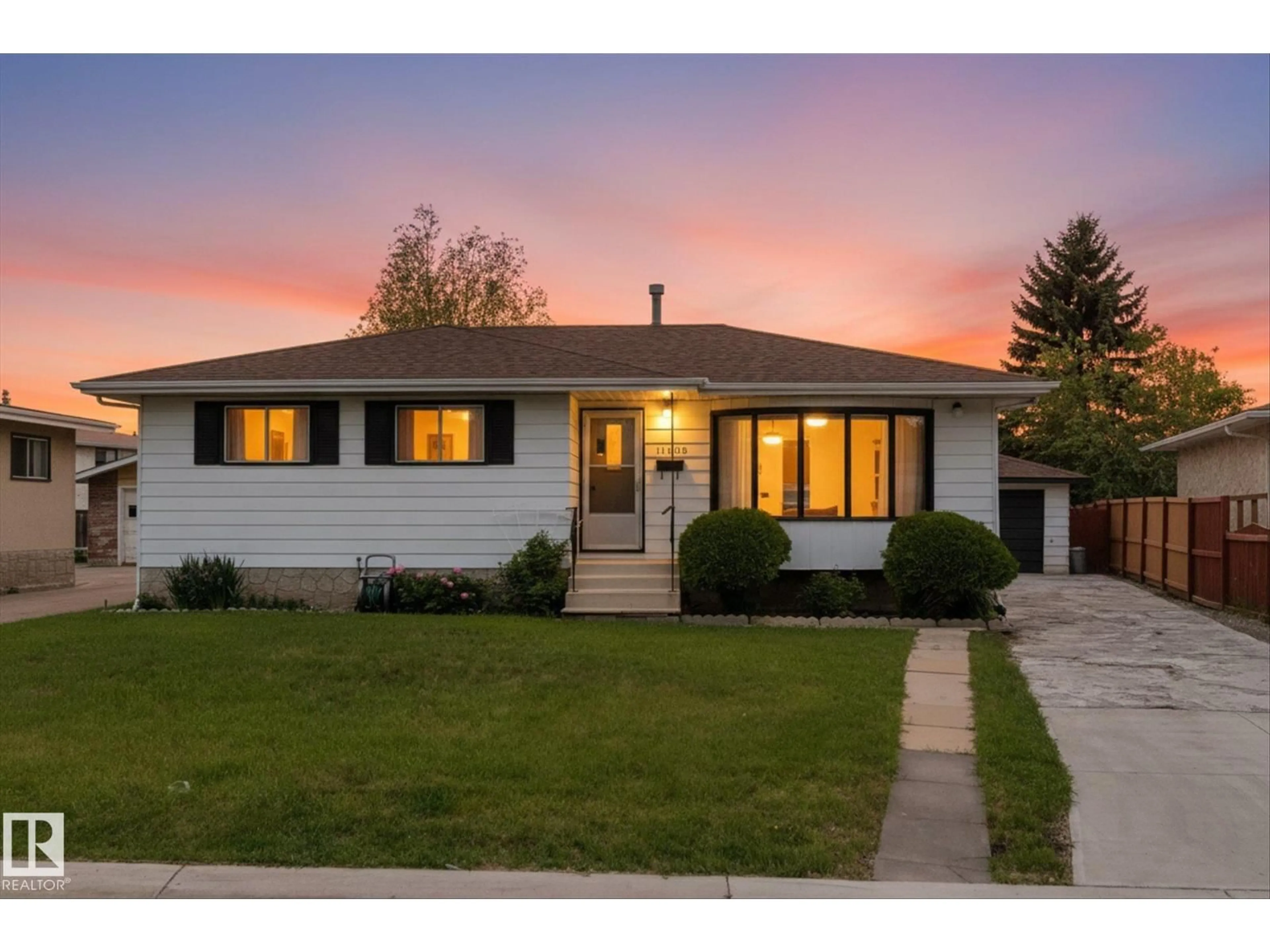 Home with vinyl exterior material, street for 11008 162A AV, Edmonton Alberta T5Z3X5