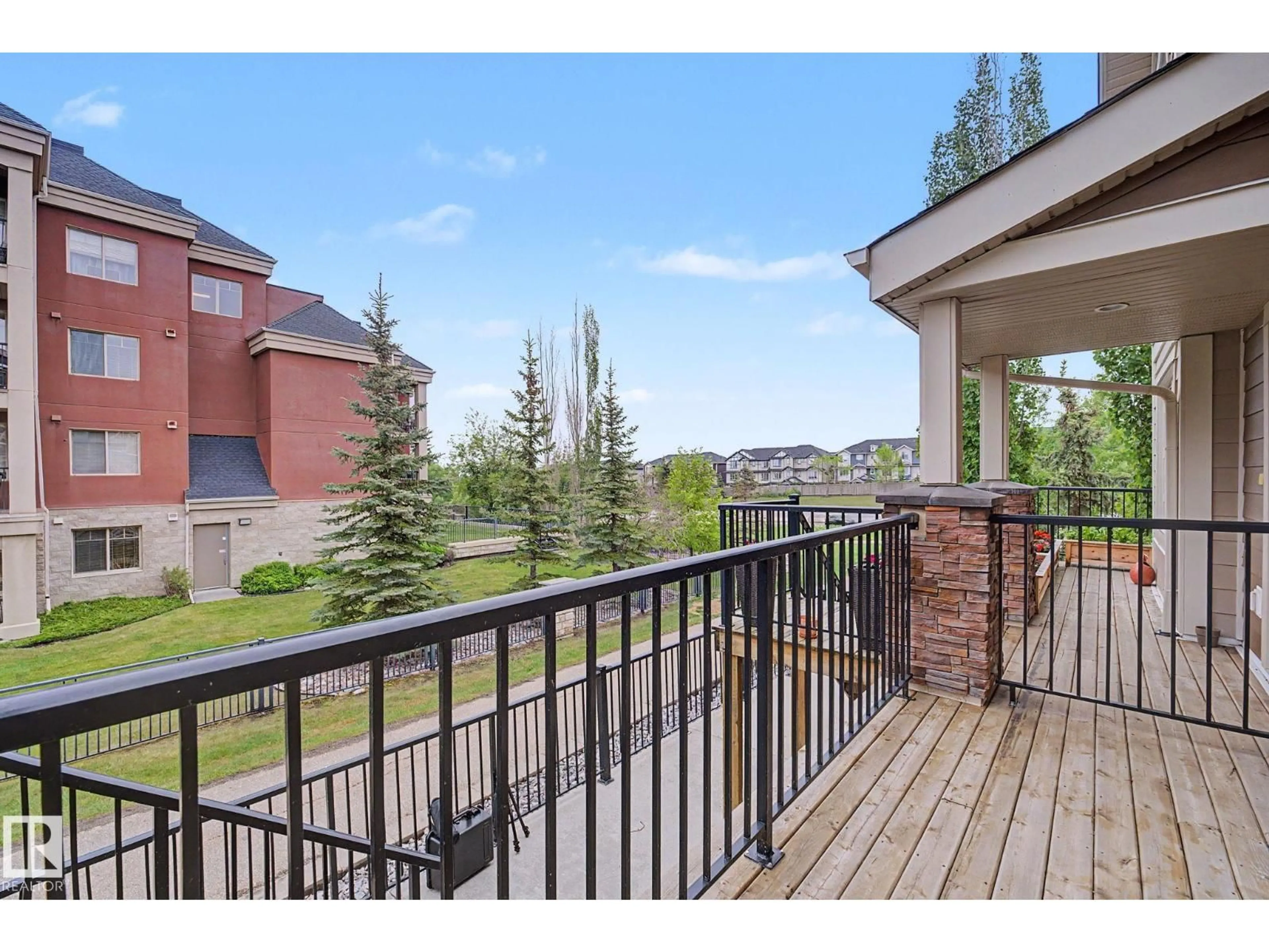 Patio, city buildings view from balcony for #702 - 401 PALISADES WY, Sherwood Park Alberta T8H0R7