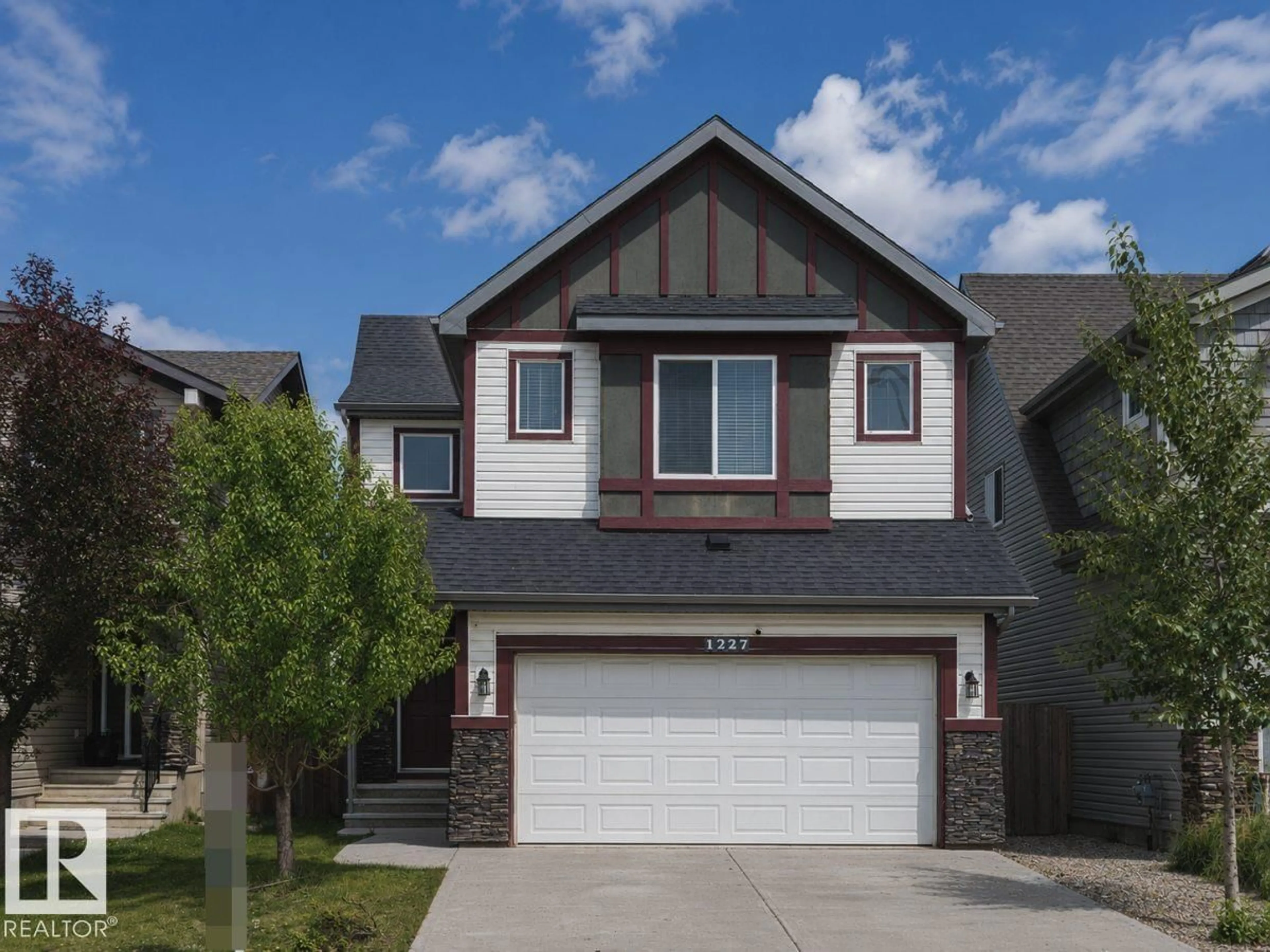 Home with vinyl exterior material, street for 1227 SECORD LANDING LD, Edmonton Alberta T5T4N3